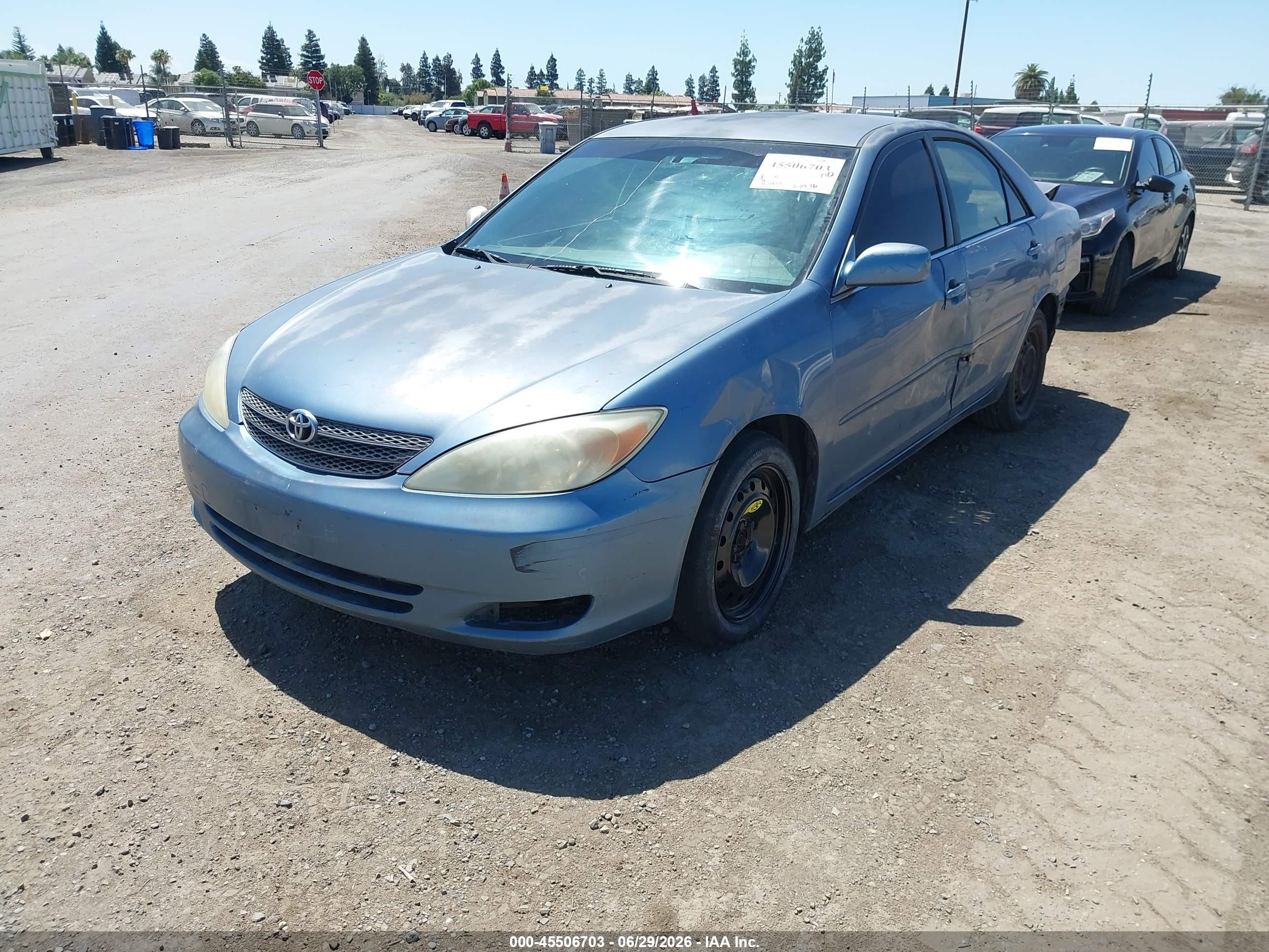 2002 Toyota Camry Le Blue vin: JTDBE32K620029967