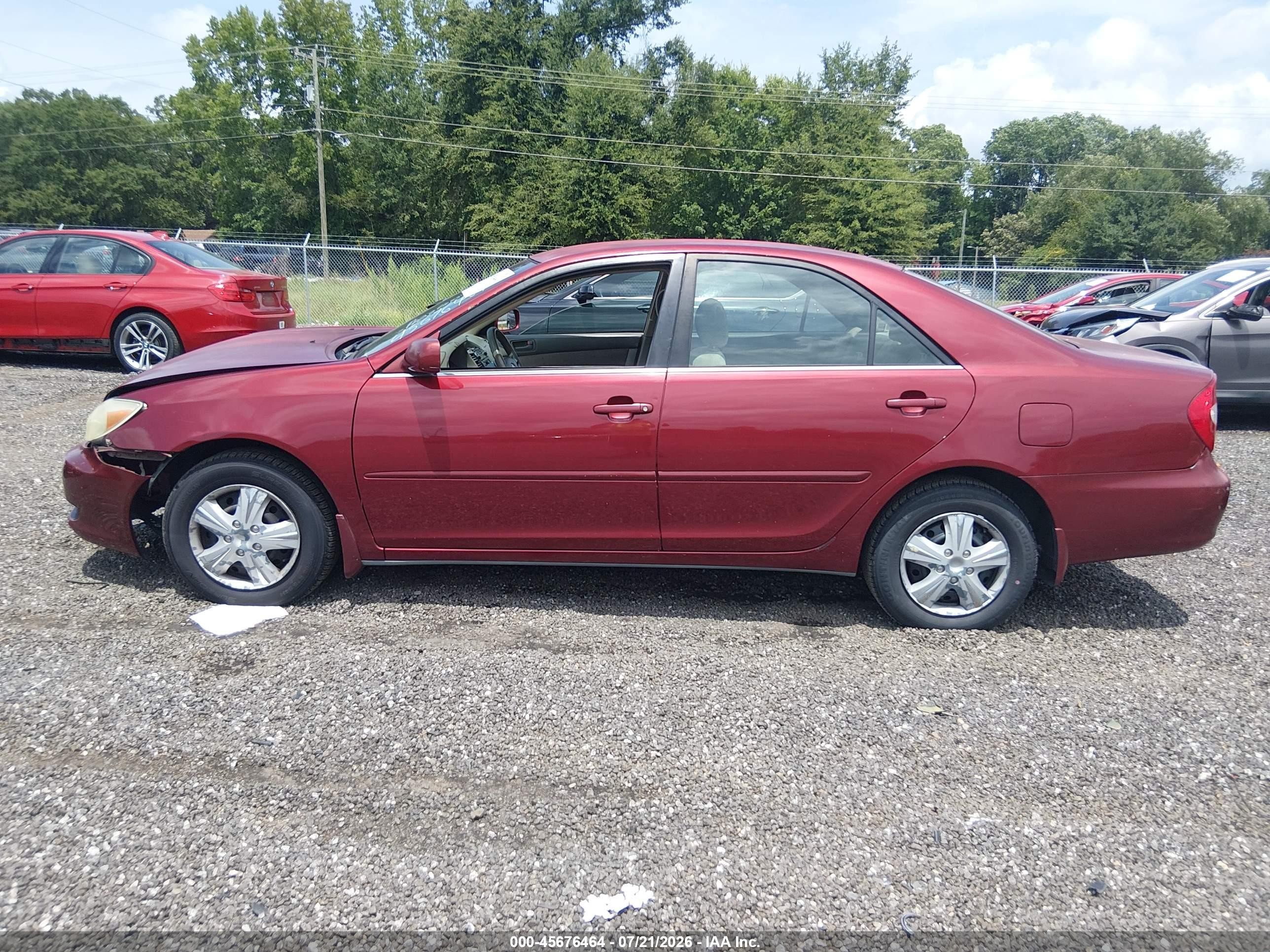 2002 Toyota Camry Le Красный vin: JTDBE32K620115084
