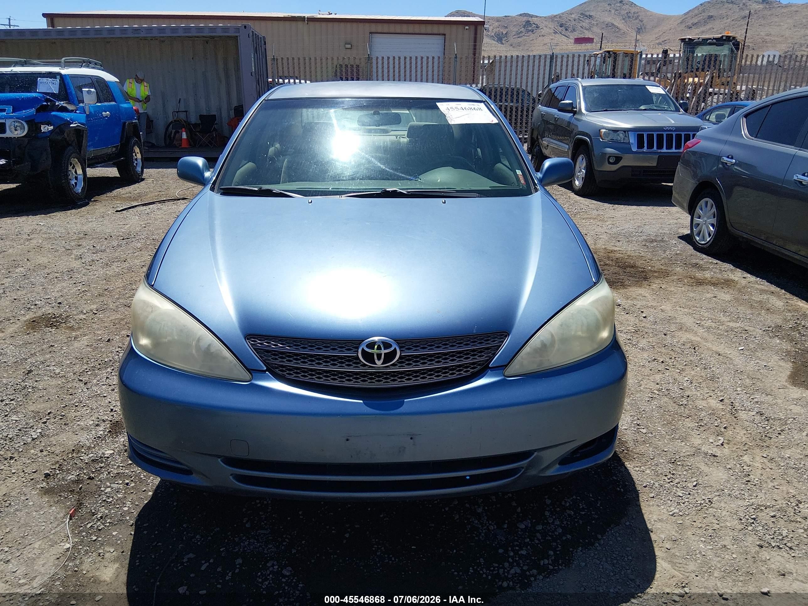 2004 Toyota Camry Le Blue vin: JTDBE32K640260337