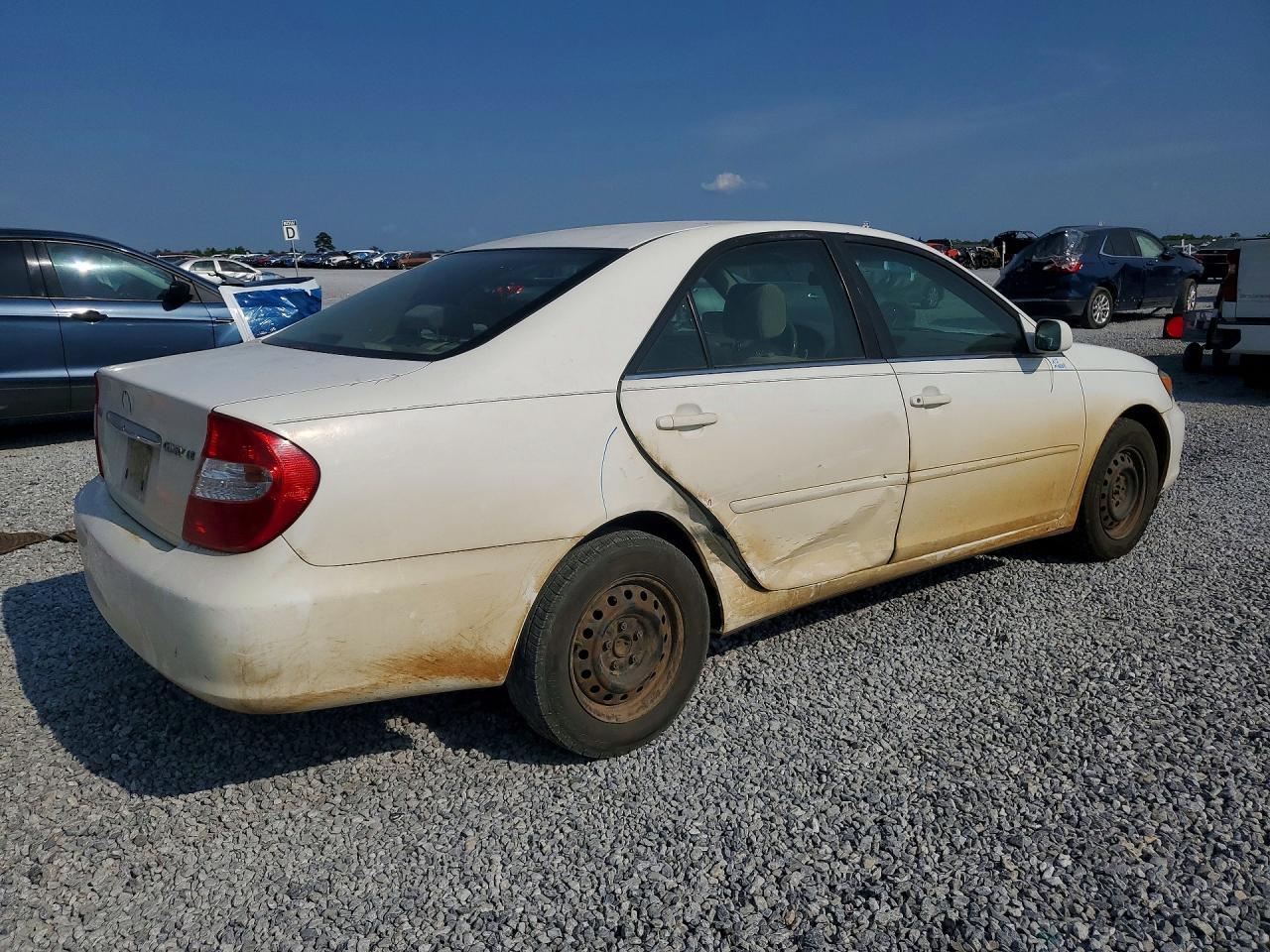 2002 Toyota Camry Le Белый vin: JTDBE32K820103664