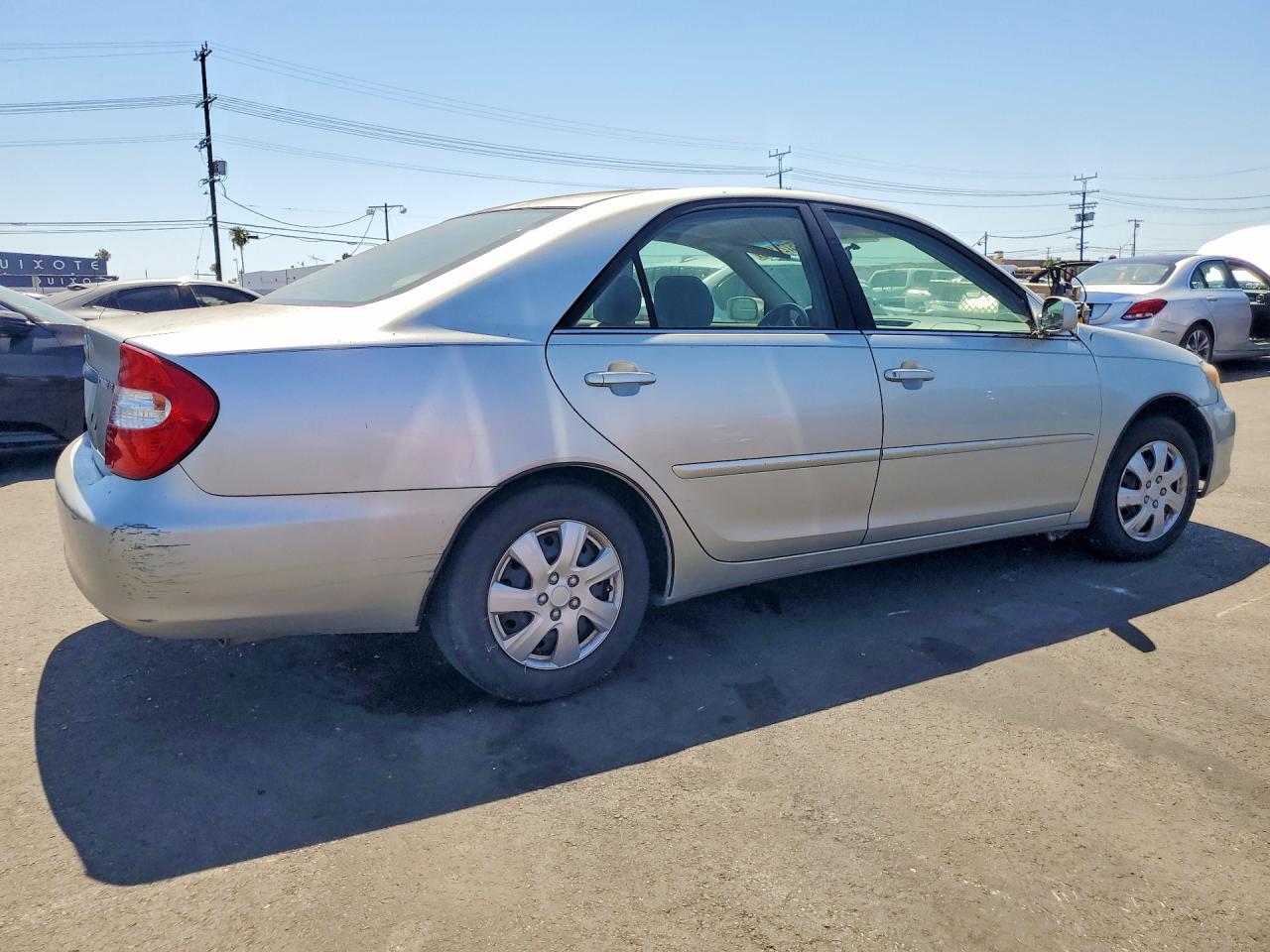 2002 Toyota Camry Серебряный vin: JTDBE32K920109781