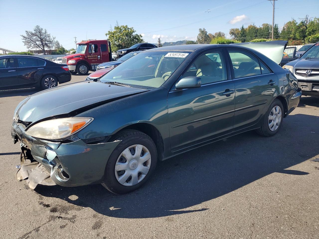 2002 Toyota Camry Le Green vin: JTDBE32KX20034704