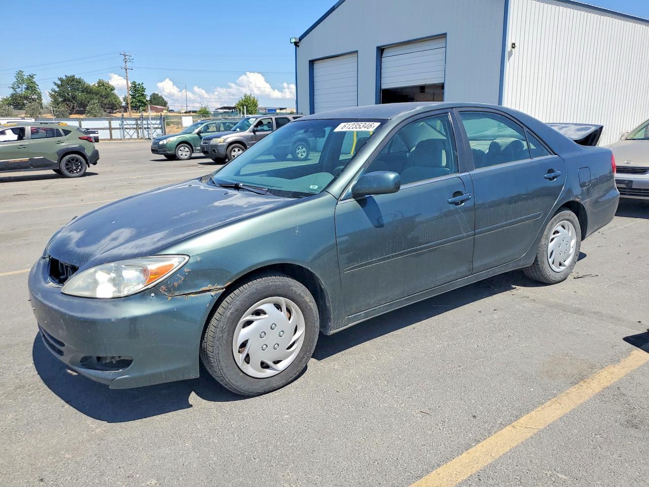 2002 Toyota Camry Le Green vin: JTDBE32KX20063345