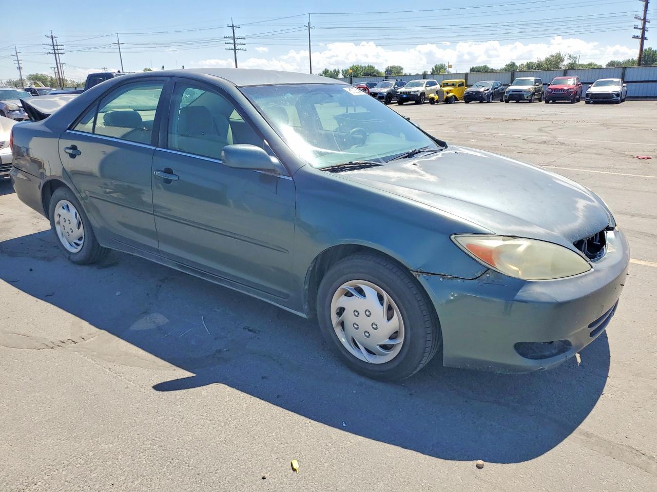 2002 Toyota Camry Le Green vin: JTDBE32KX20063345