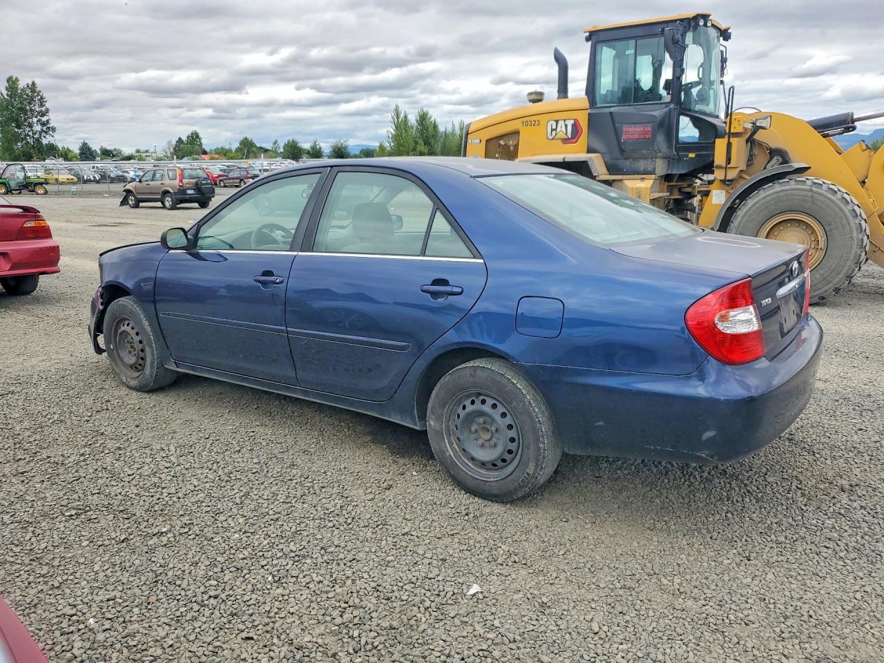 2003 Toyota Camry Le Blue vin: JTDBE32KX30144198