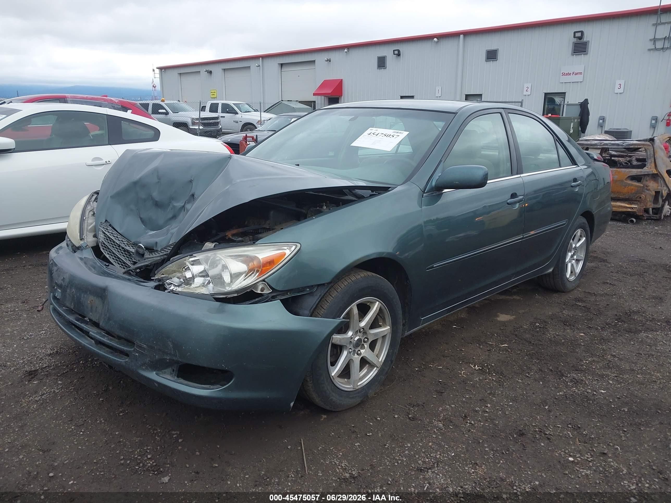 2003 Toyota Camry Xle Green vin: JTDBE32KX30153399