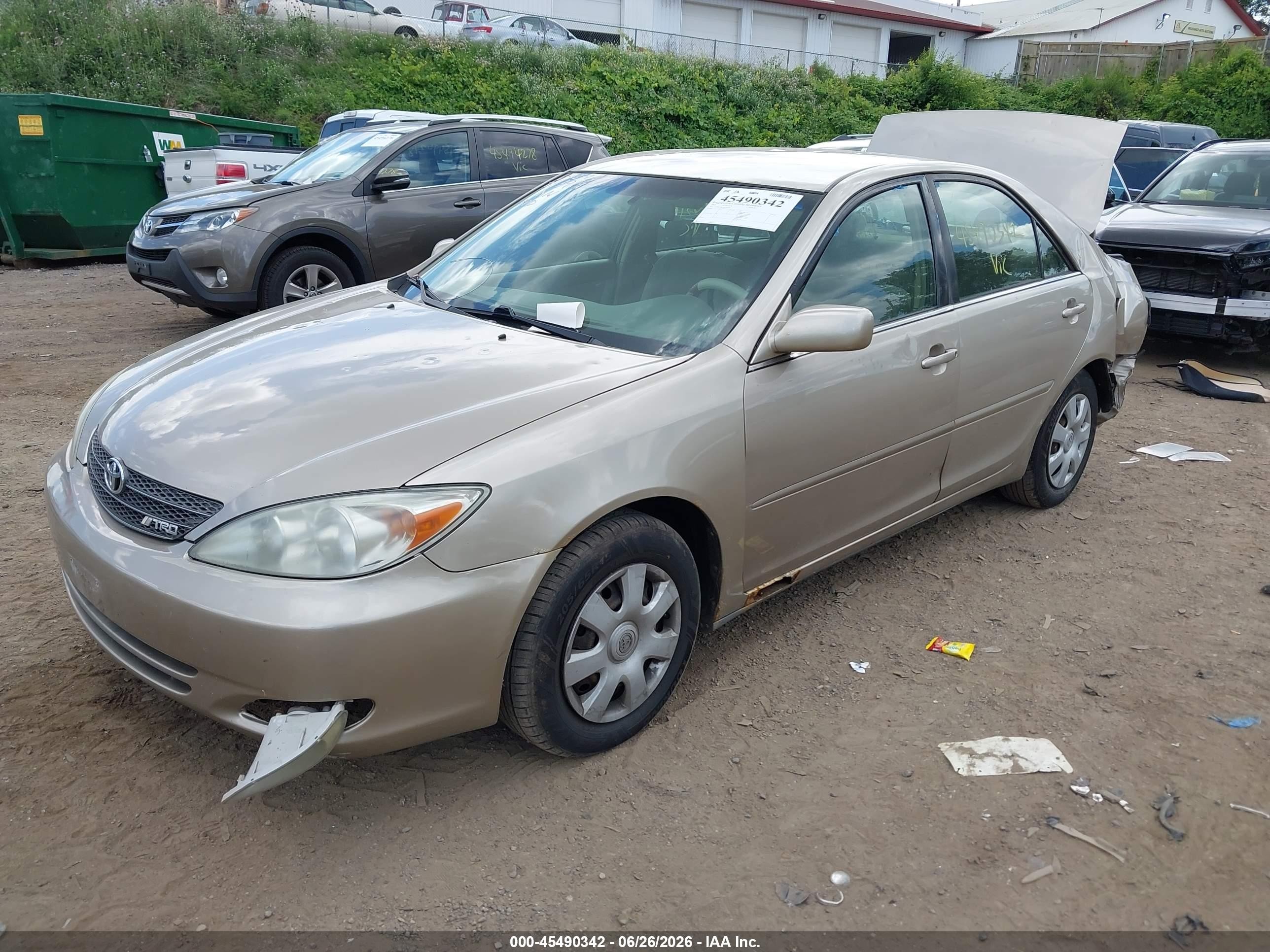 2003 Toyota Camry Le Желто-коричневый vin: JTDBE32KX30203699