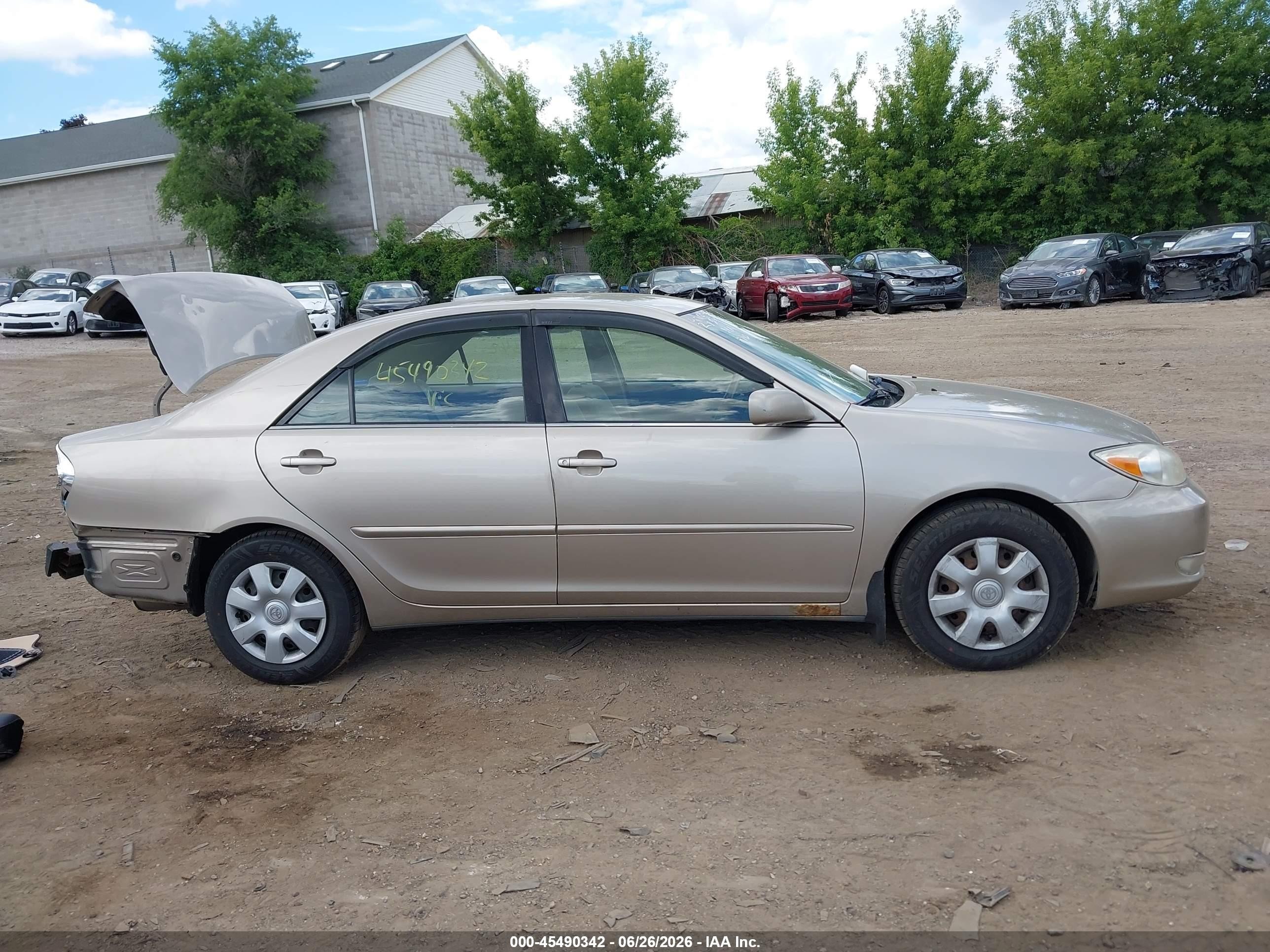 2003 Toyota Camry Le Желто-коричневый vin: JTDBE32KX30203699