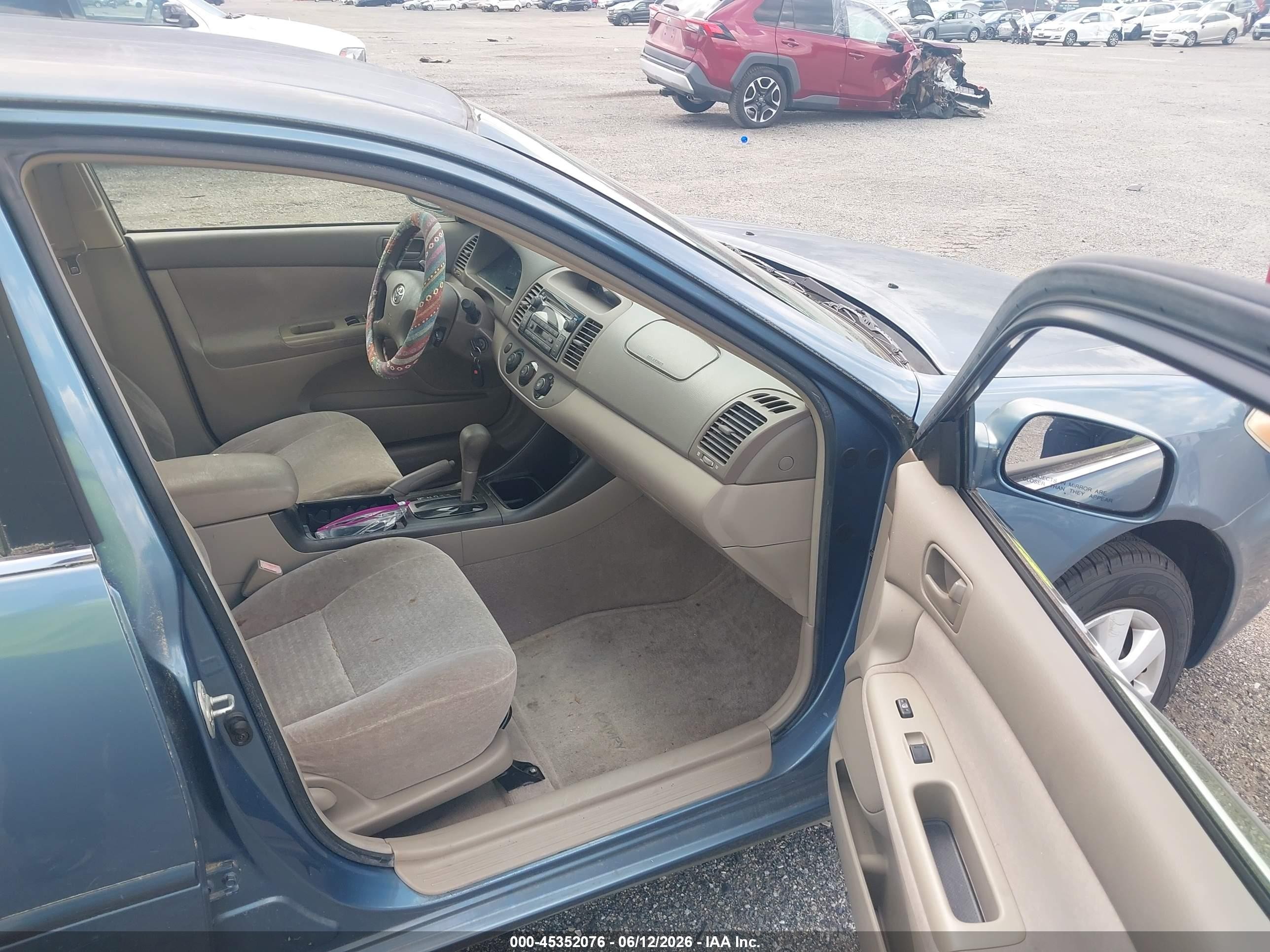2003 Toyota Camry Le Blue vin: JTDBE32KX30227713