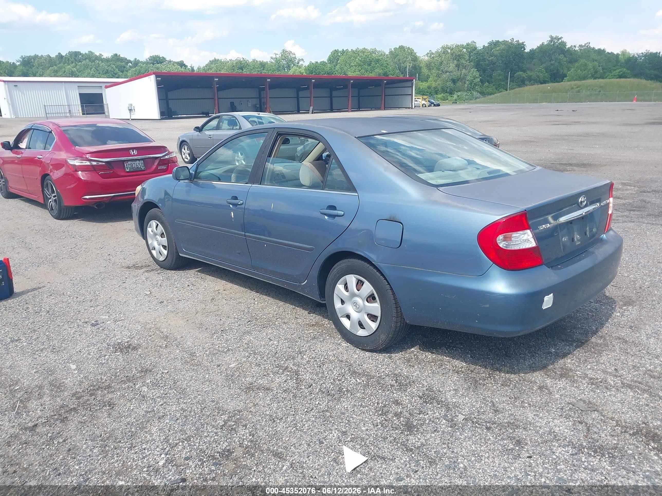 2003 Toyota Camry Le Blue vin: JTDBE32KX30227713