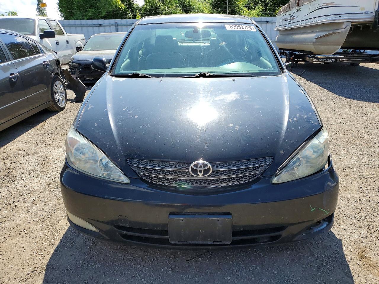 2002 Toyota Camry Le V6 Black vin: JTDBF30K720030383