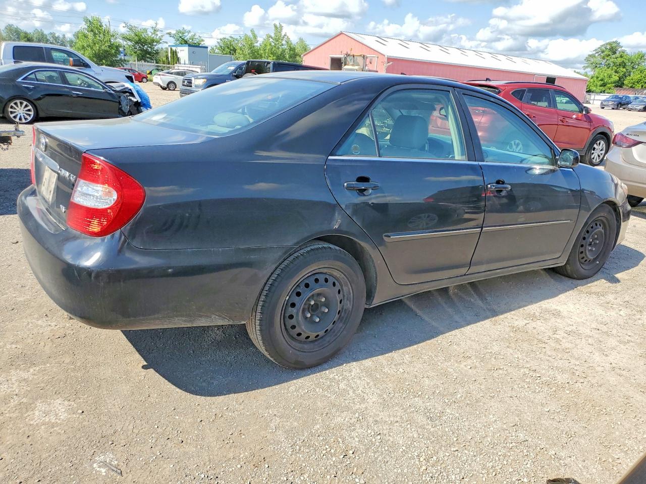2002 Toyota Camry Le V6 Black vin: JTDBF30K720030383