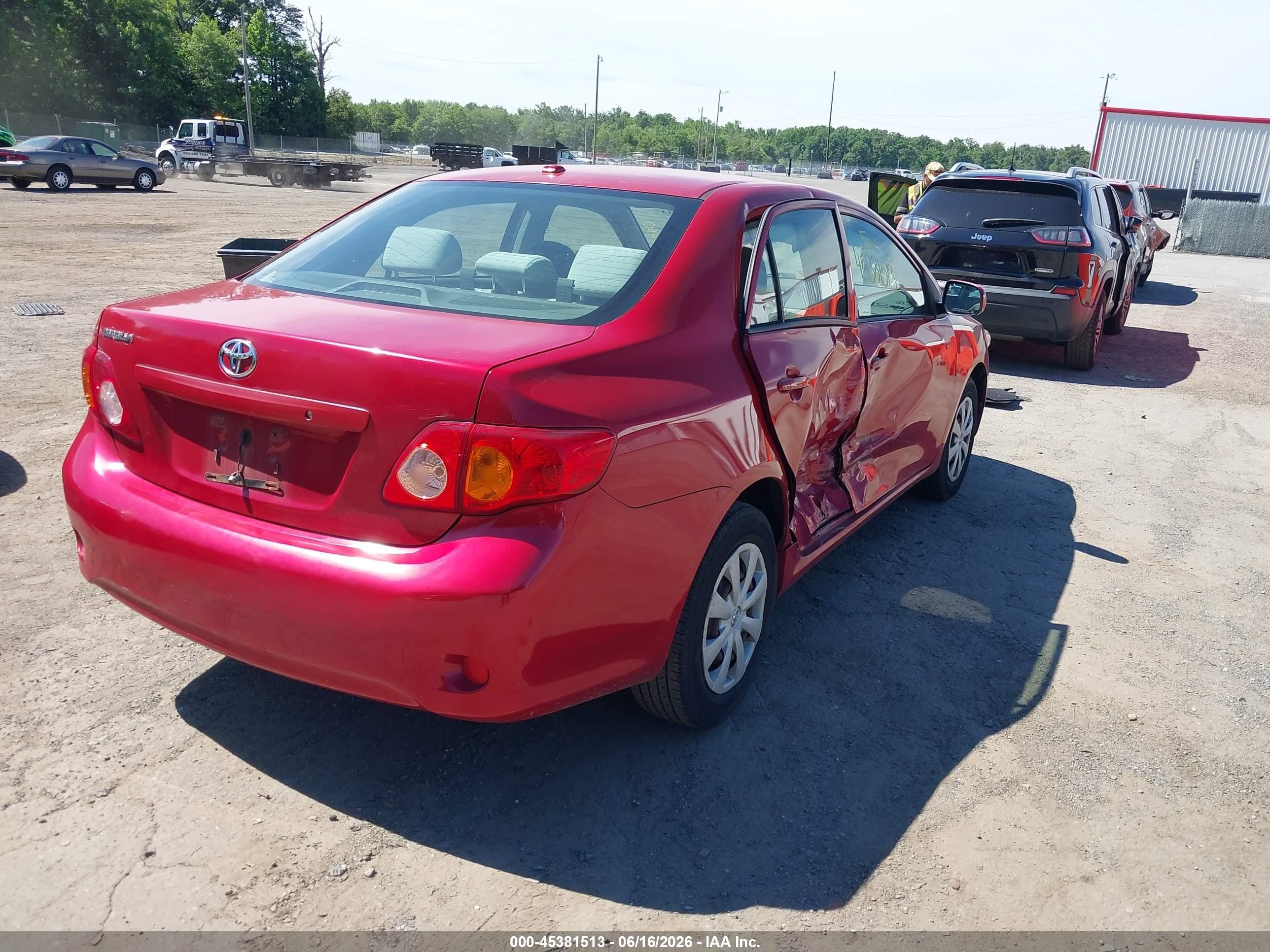 2009 Toyota Corolla Le Red vin: JTDBL40E09J004852