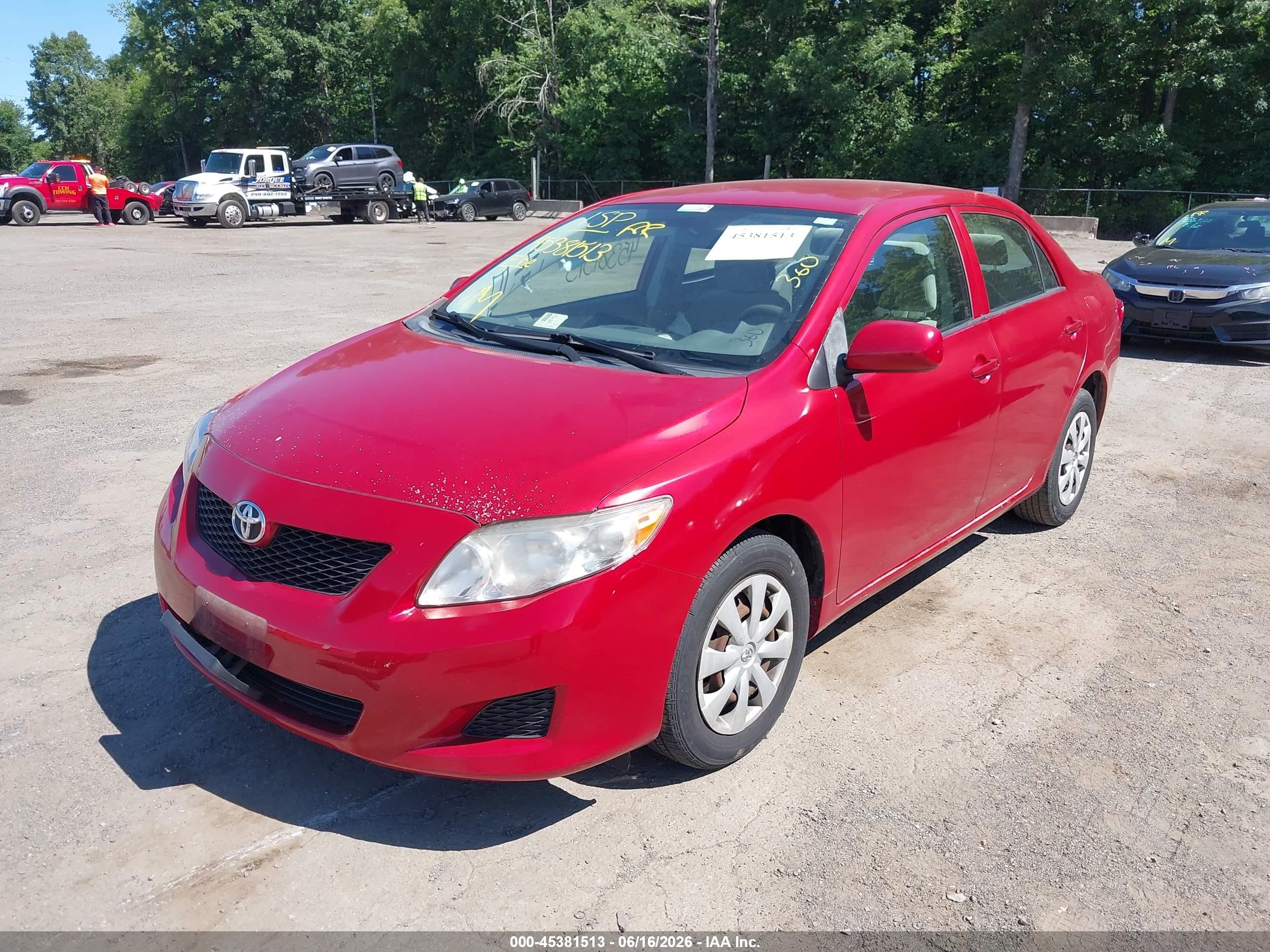 2009 Toyota Corolla Le Red vin: JTDBL40E09J004852