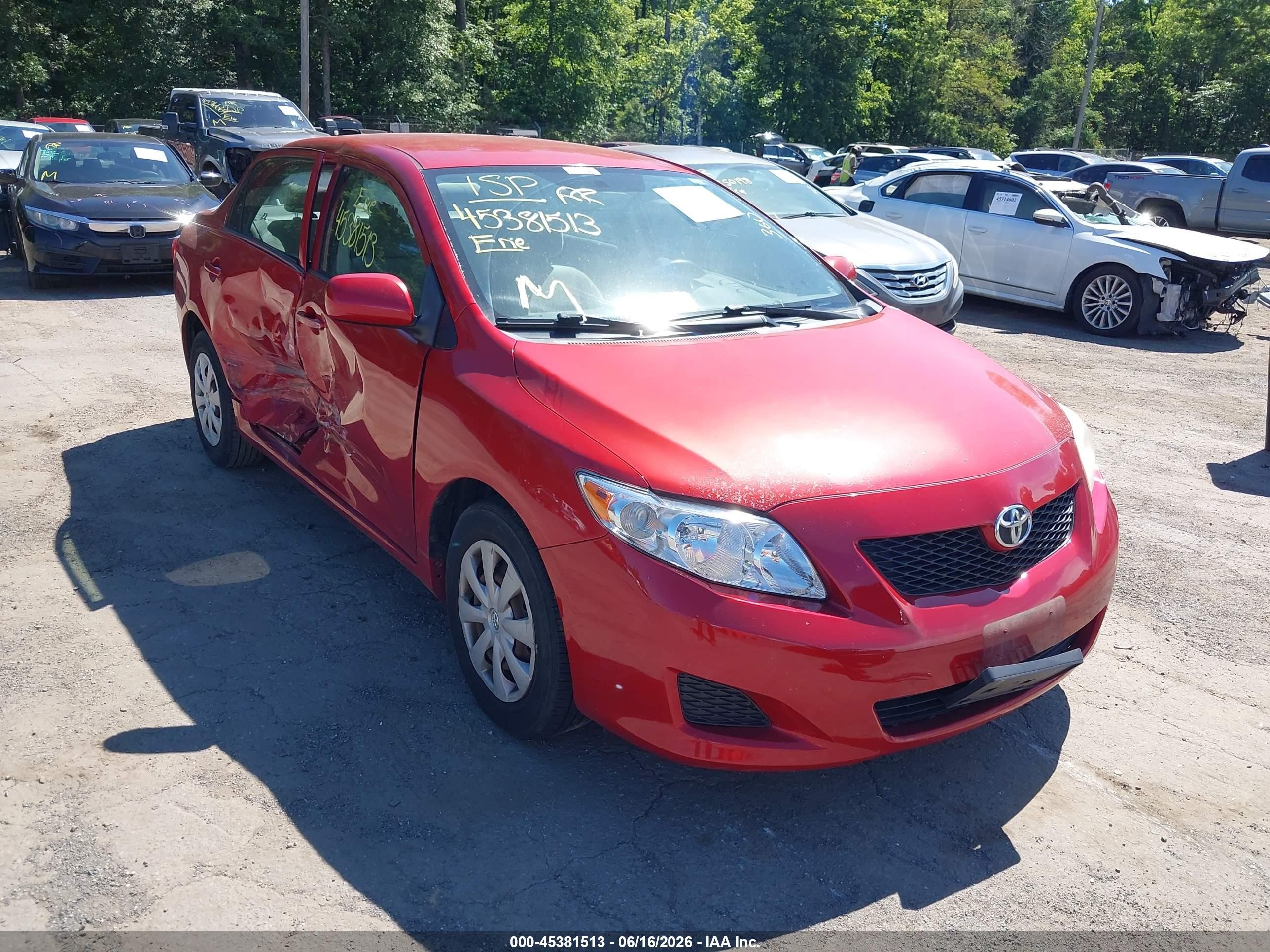 2009 Toyota Corolla Le Red vin: JTDBL40E09J004852