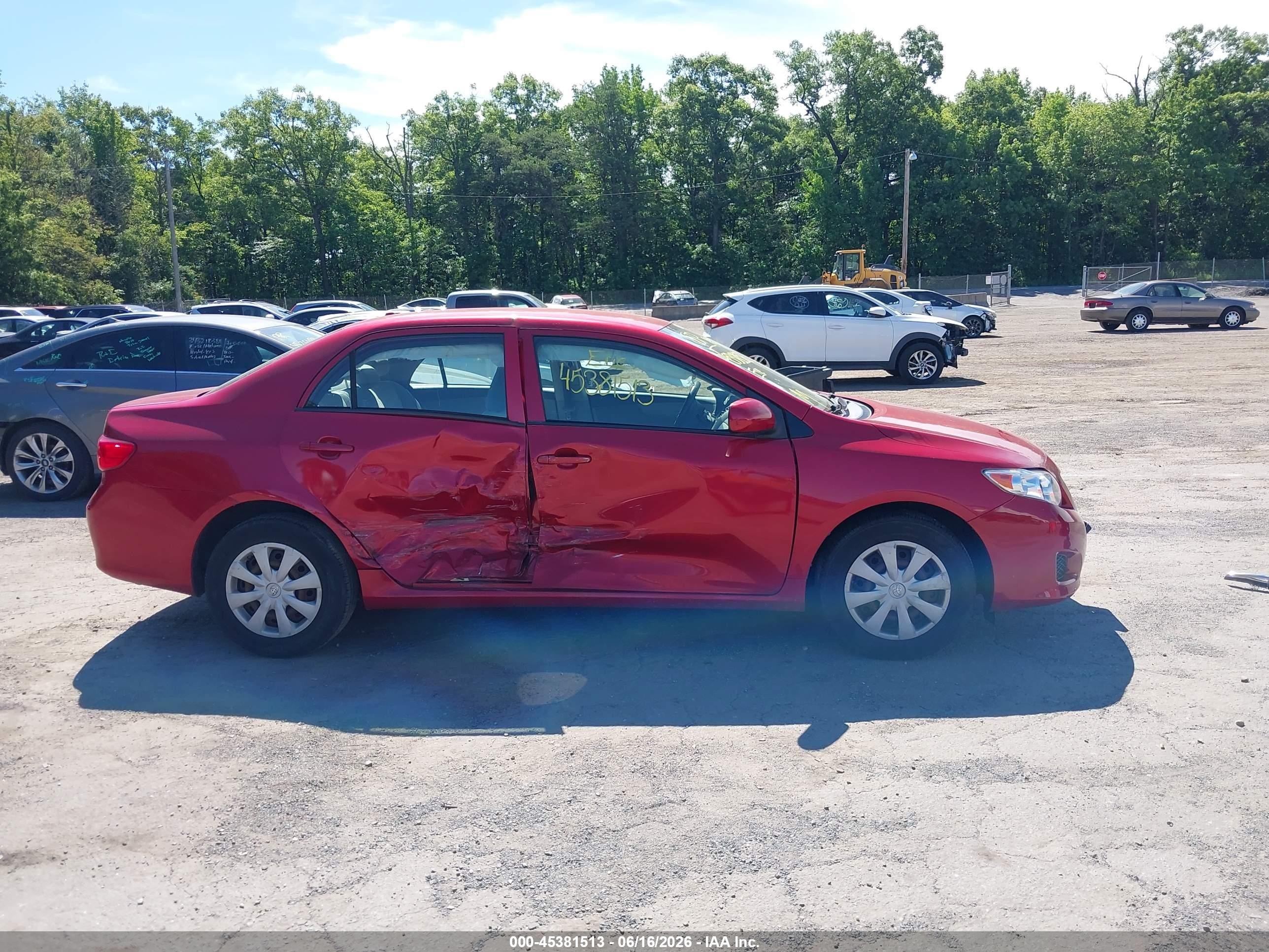 2009 Toyota Corolla Le Red vin: JTDBL40E09J004852