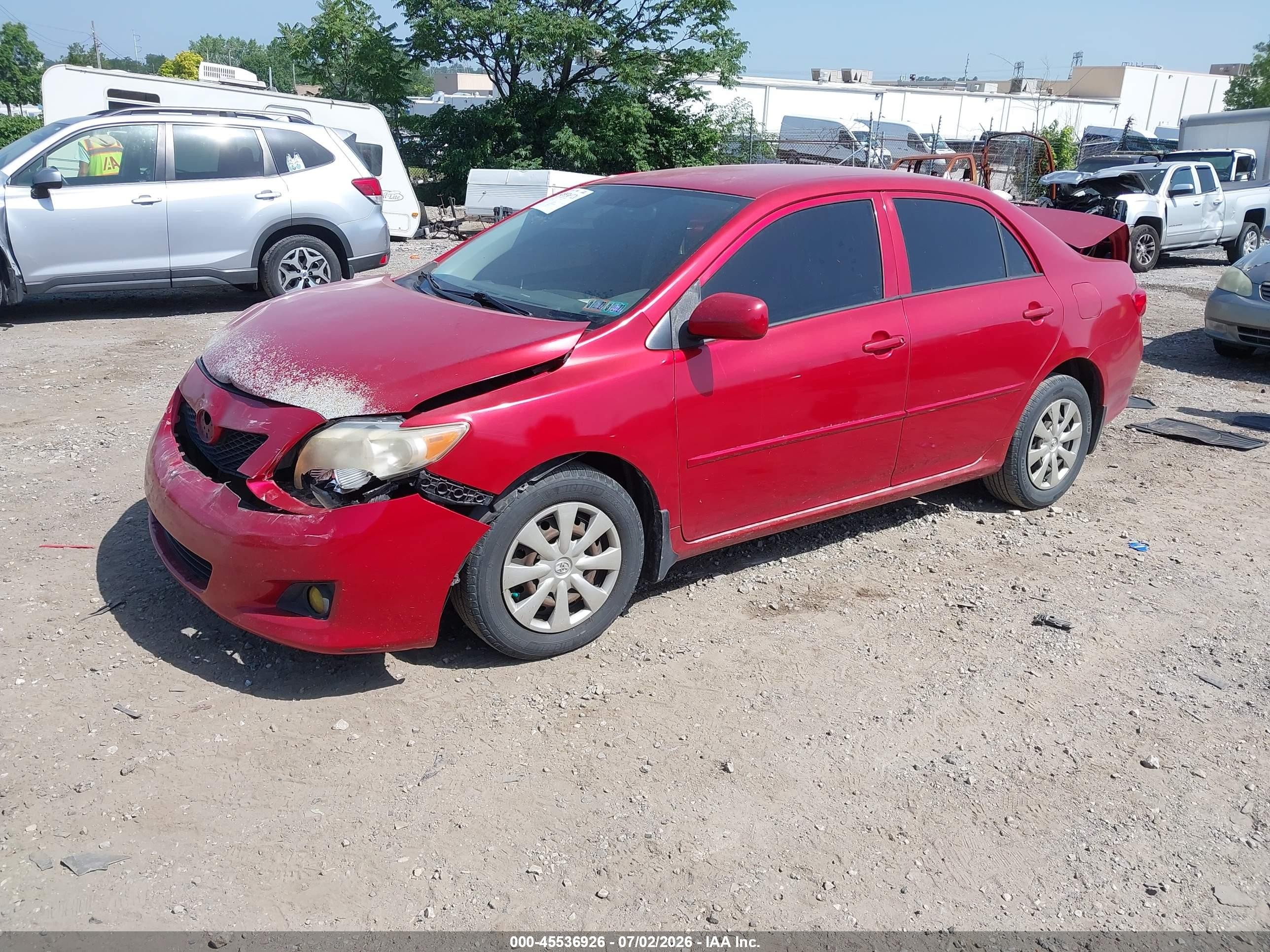 2009 Toyota Corolla Le Red vin: JTDBL40E09J008352