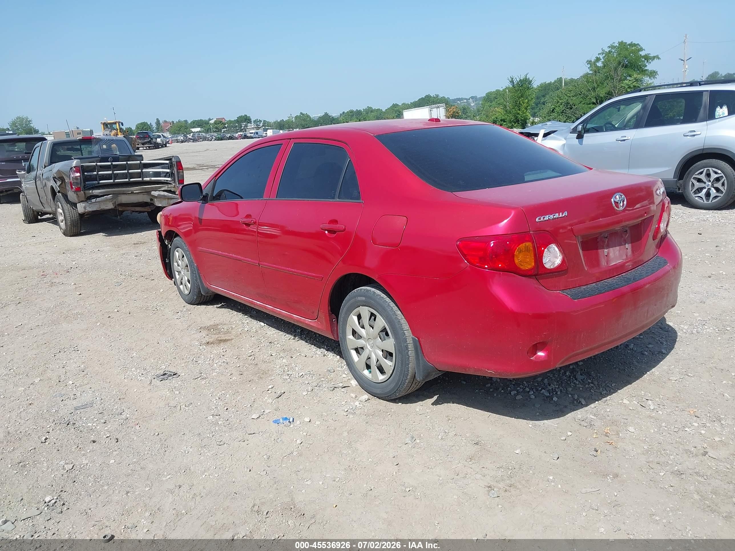 2009 Toyota Corolla Le Red vin: JTDBL40E09J008352