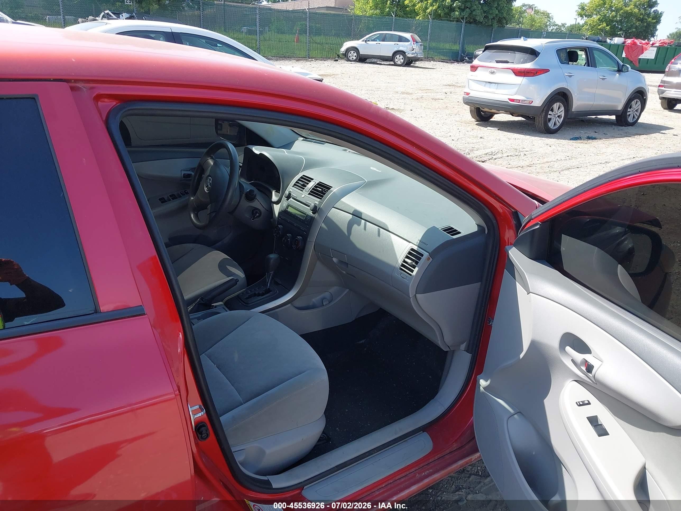 2009 Toyota Corolla Le Red vin: JTDBL40E09J008352
