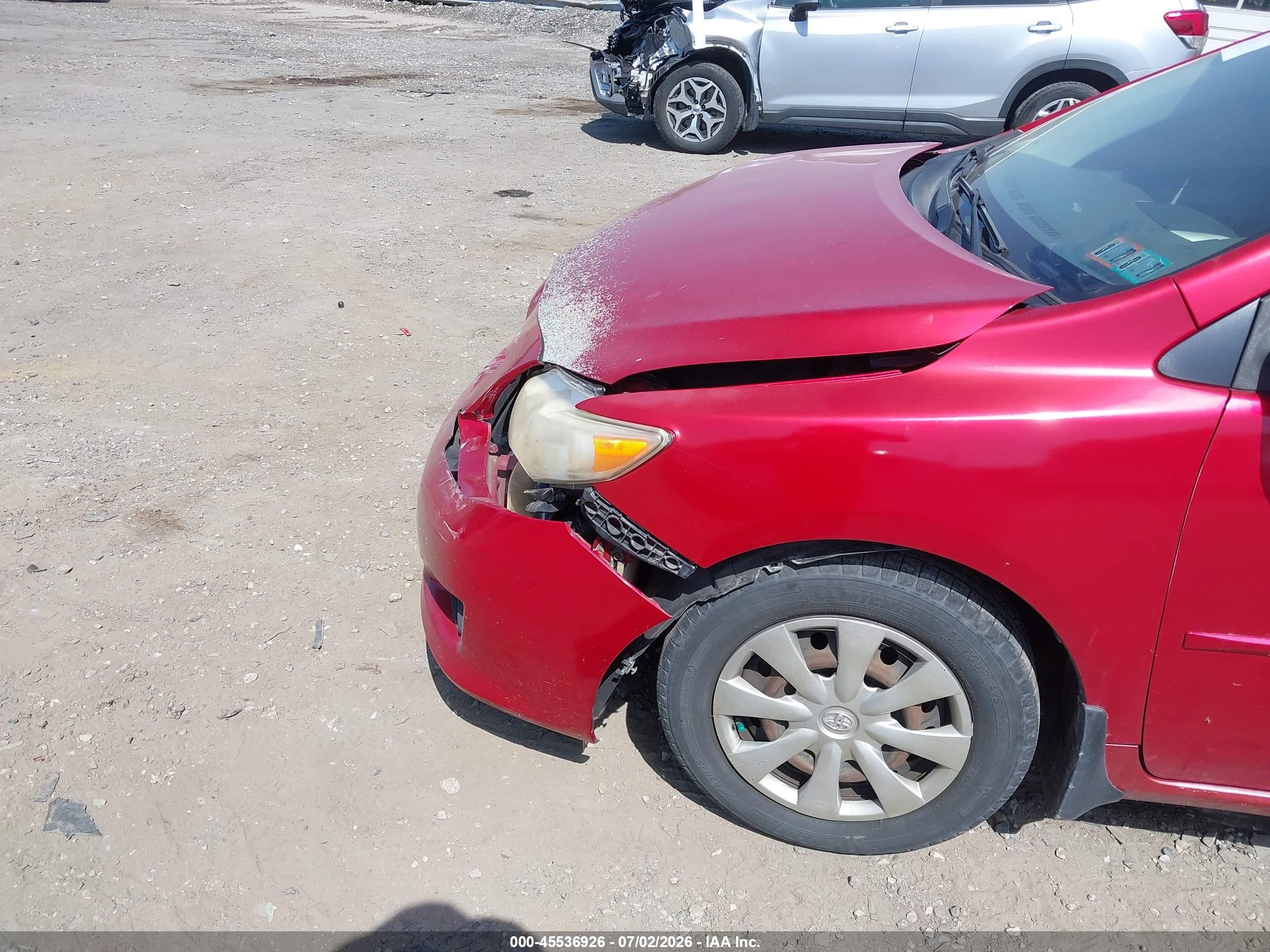 2009 Toyota Corolla Le Red vin: JTDBL40E09J008352
