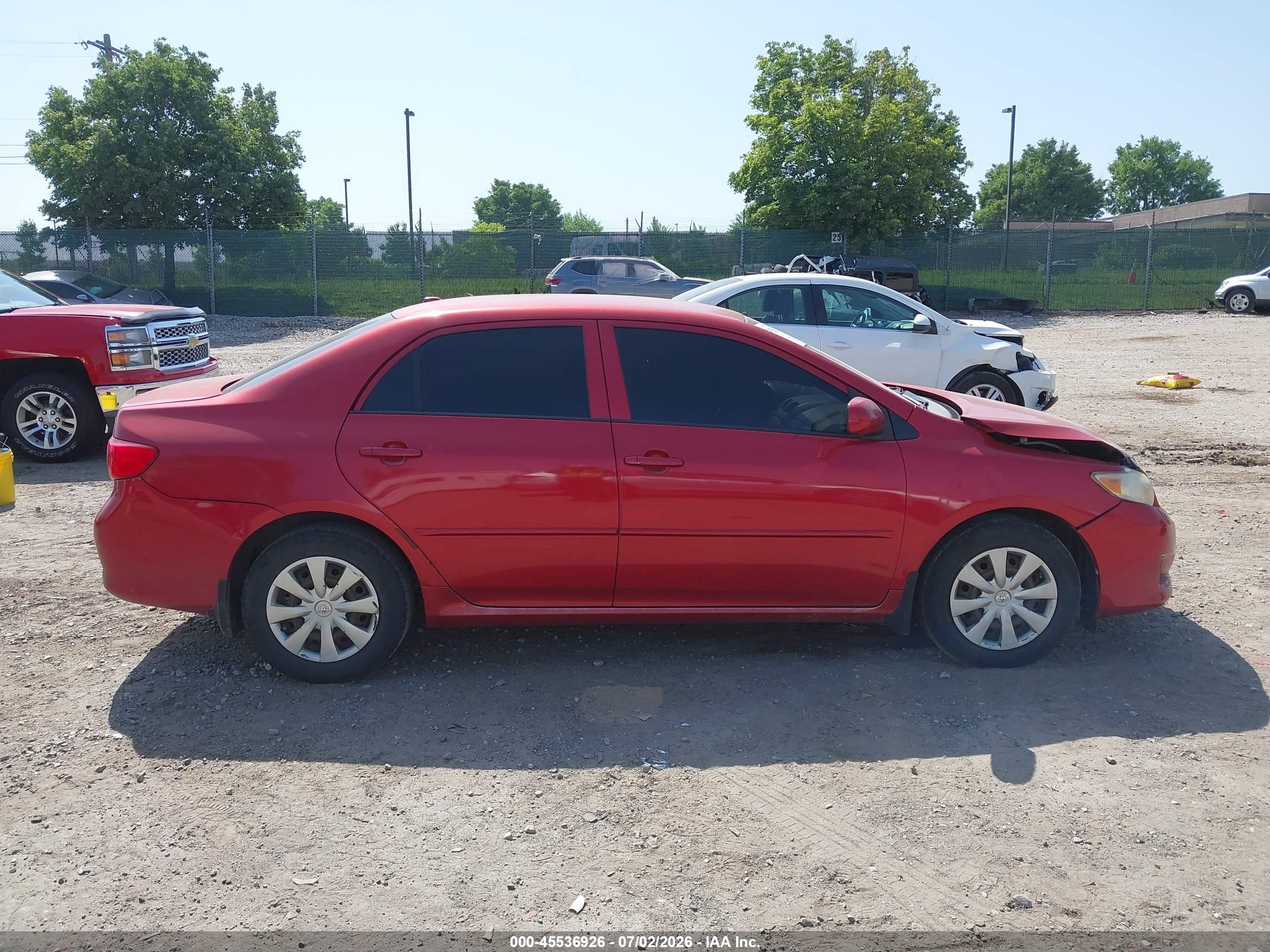 2009 Toyota Corolla Le Red vin: JTDBL40E09J008352