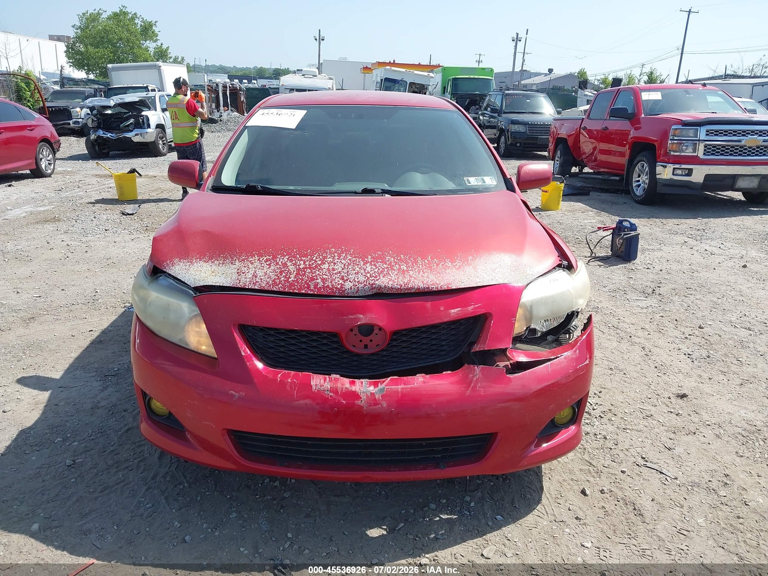 2009 Toyota Corolla Le Red vin: JTDBL40E09J008352