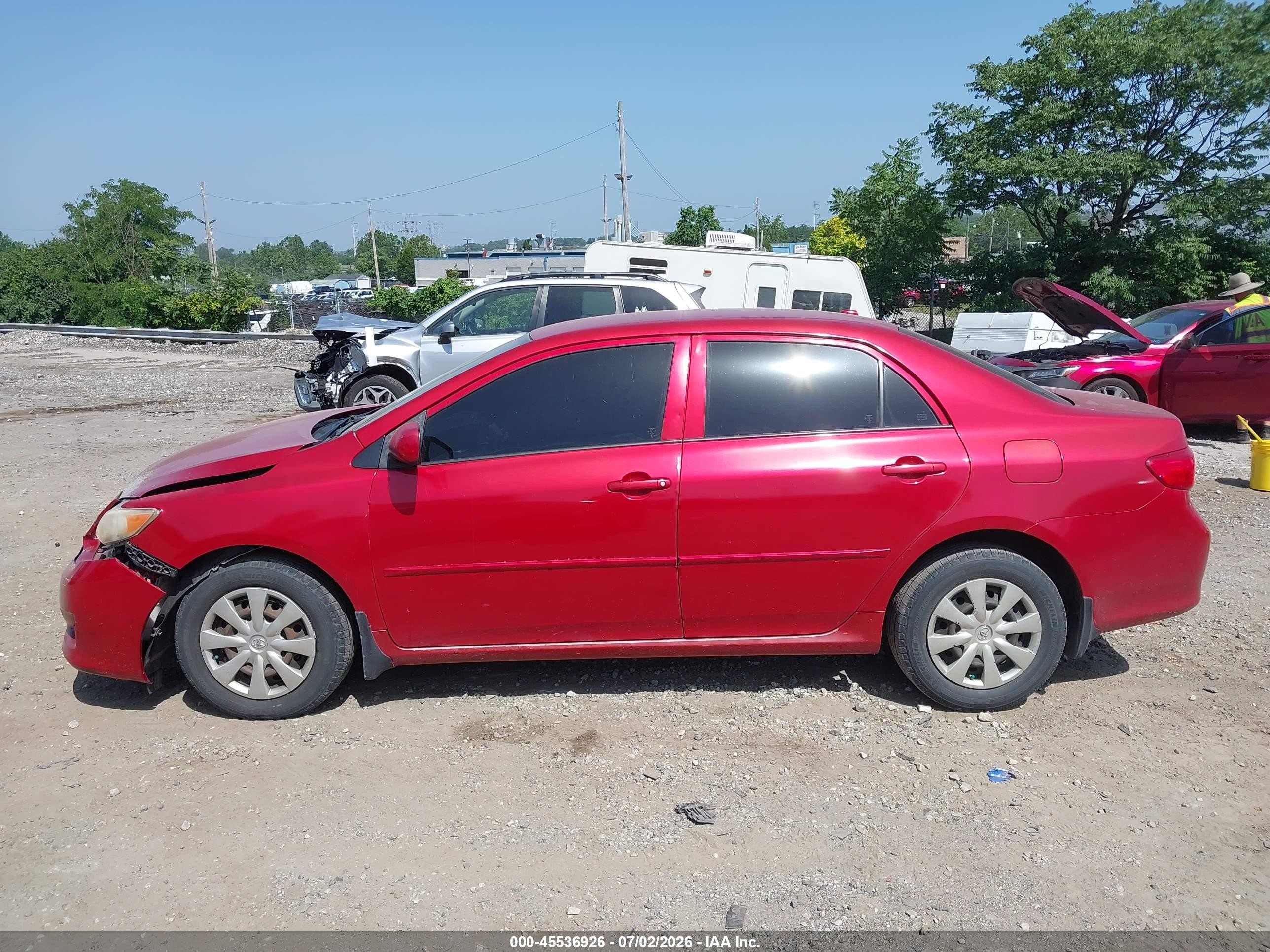 2009 Toyota Corolla Le Red vin: JTDBL40E09J008352