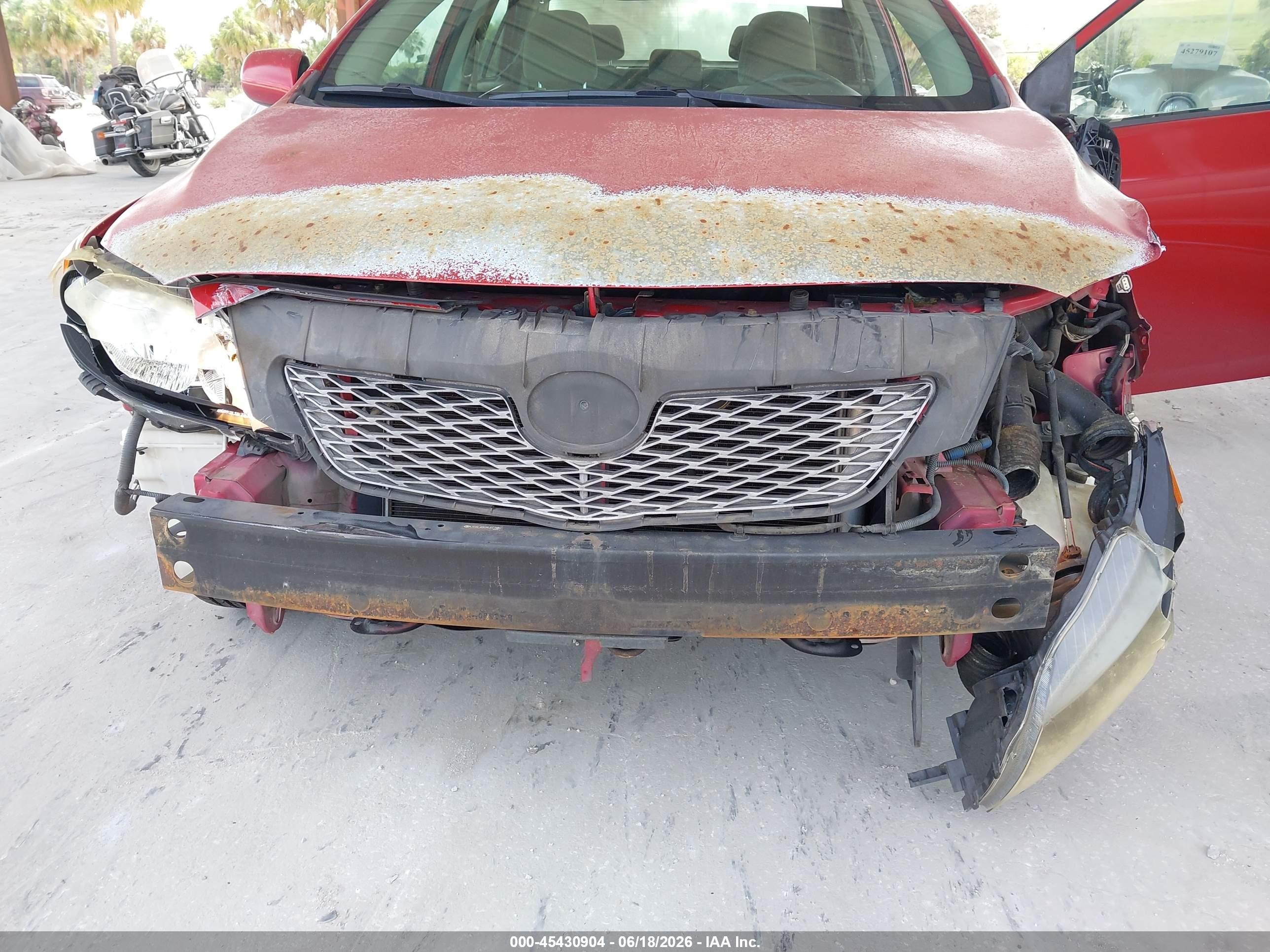 2009 Toyota Corolla Le Red vin: JTDBL40E09J017486