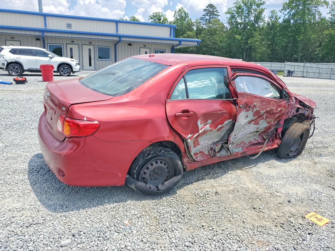2009 Toyota Corolla Le Красный vin: JTDBL40E199031270