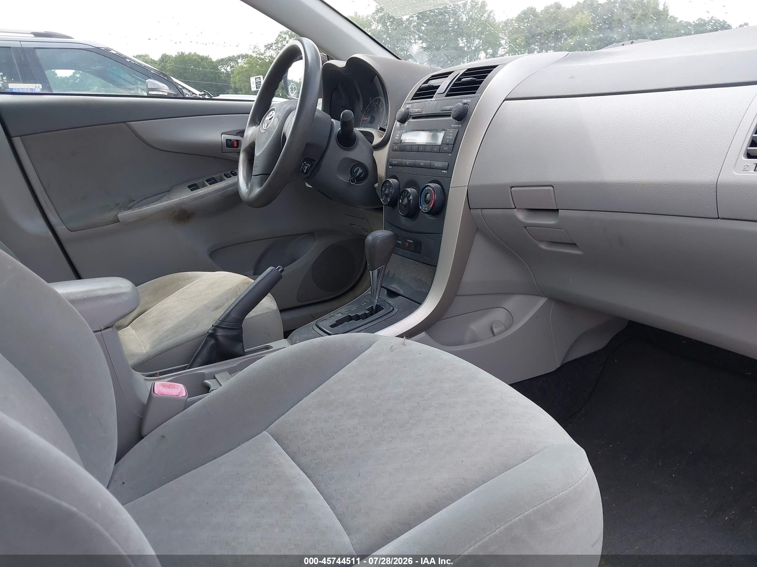 2009 Toyota Corolla Le Red vin: JTDBL40E199032712