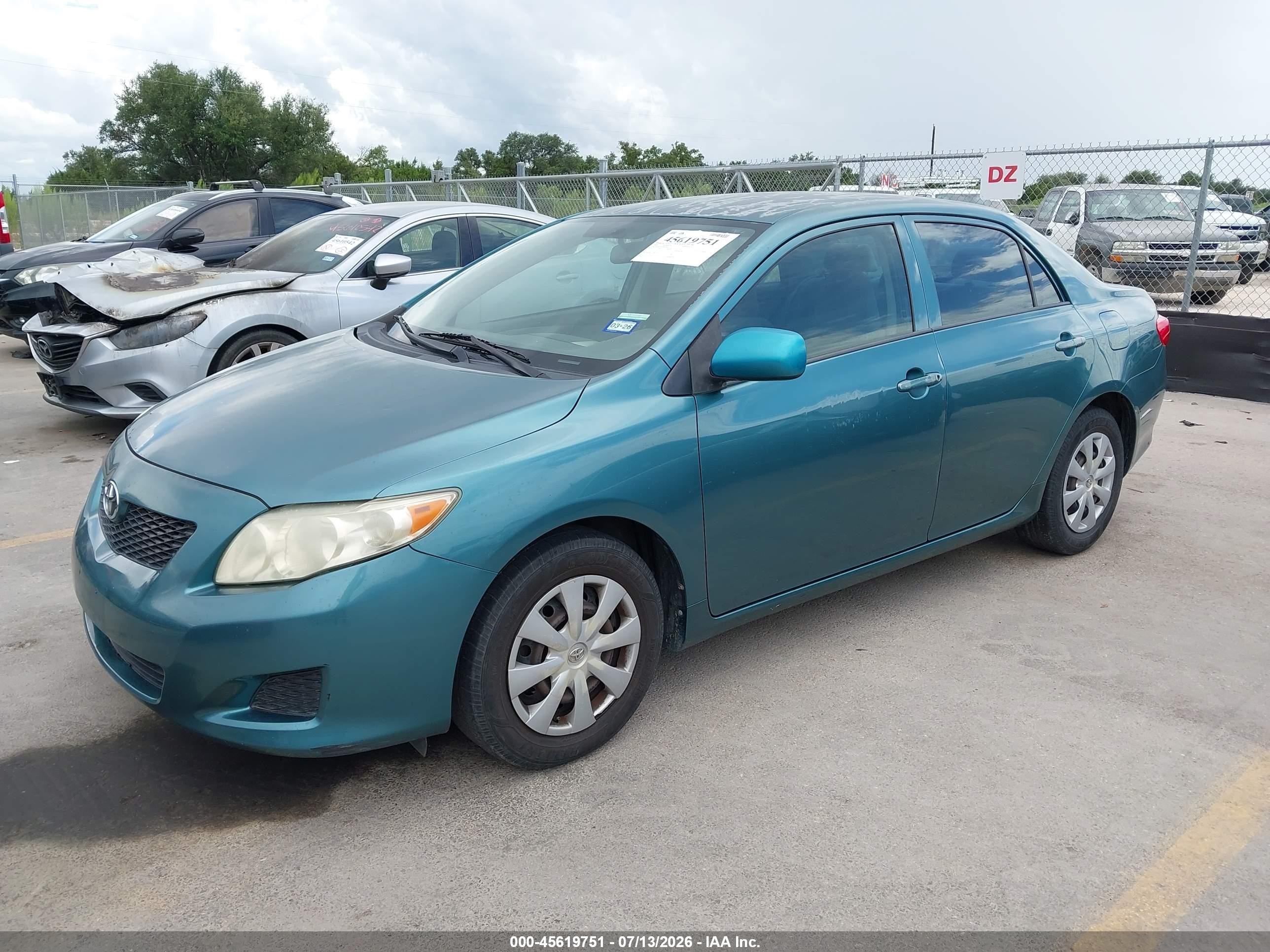 2009 Toyota Corolla Le Green vin: JTDBL40E199057075