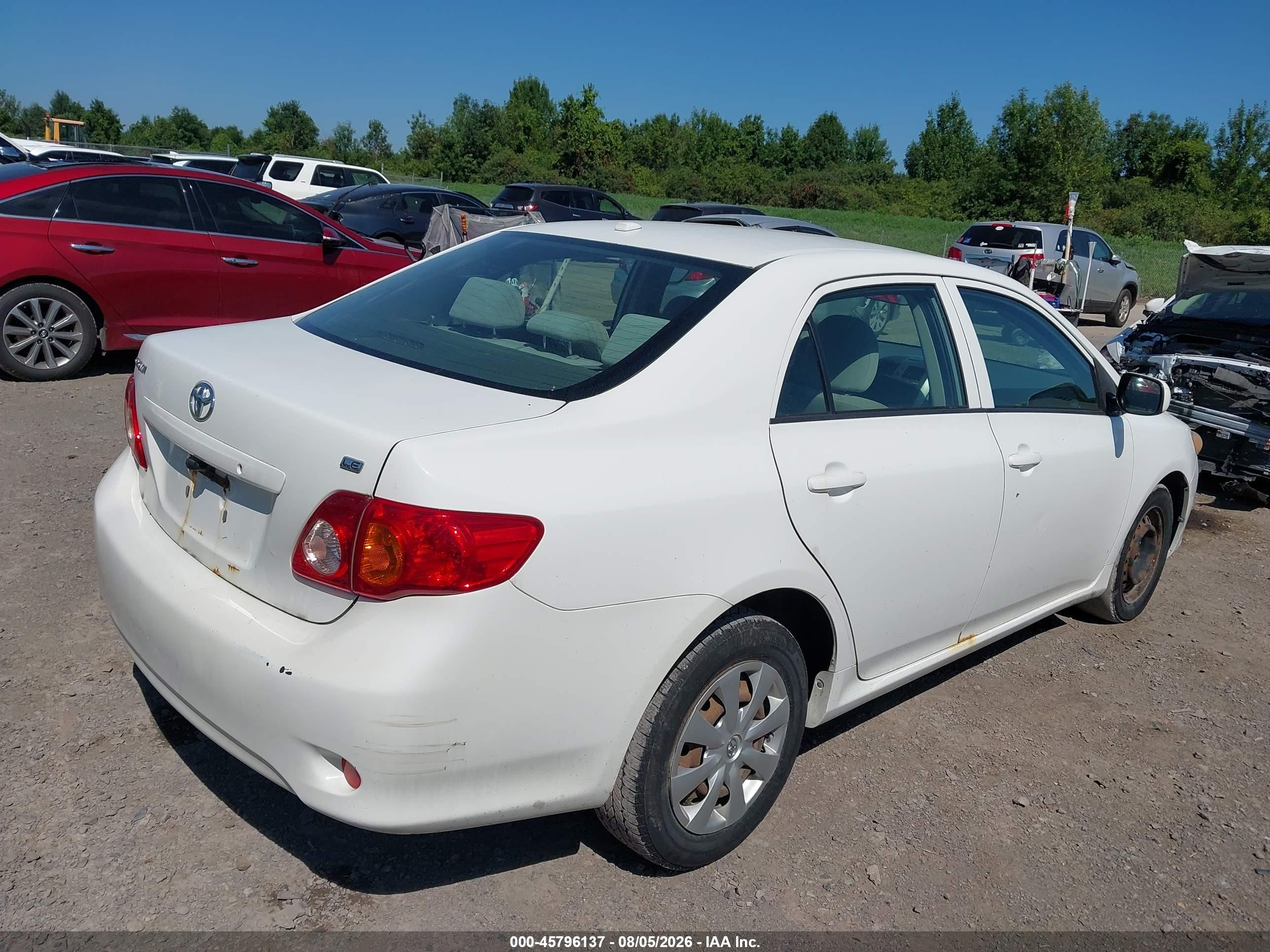 2009 Toyota Corolla Le White vin: JTDBL40E199060025