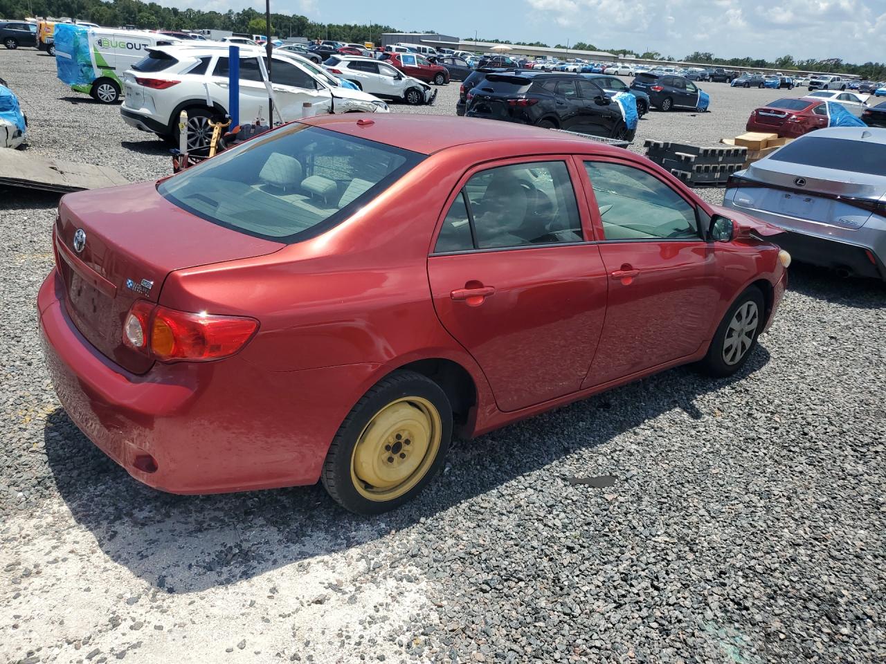 2009 Toyota Corolla Le Red vin: JTDBL40E199070490