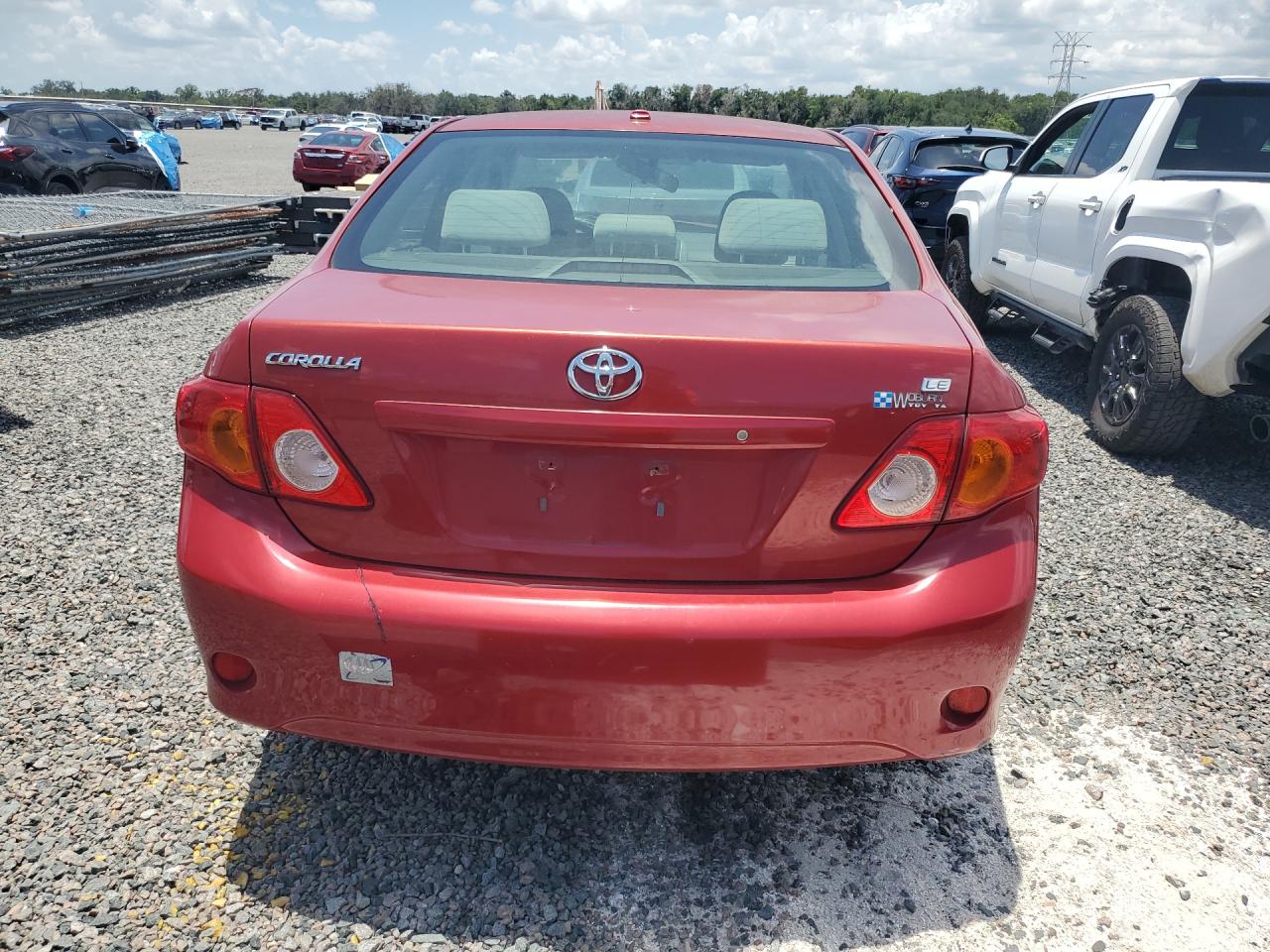 2009 Toyota Corolla Le Red vin: JTDBL40E199070490