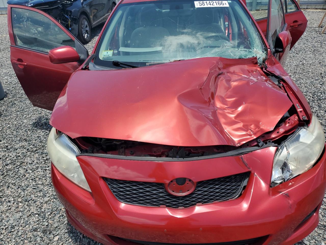 2009 Toyota Corolla Le Red vin: JTDBL40E199070490