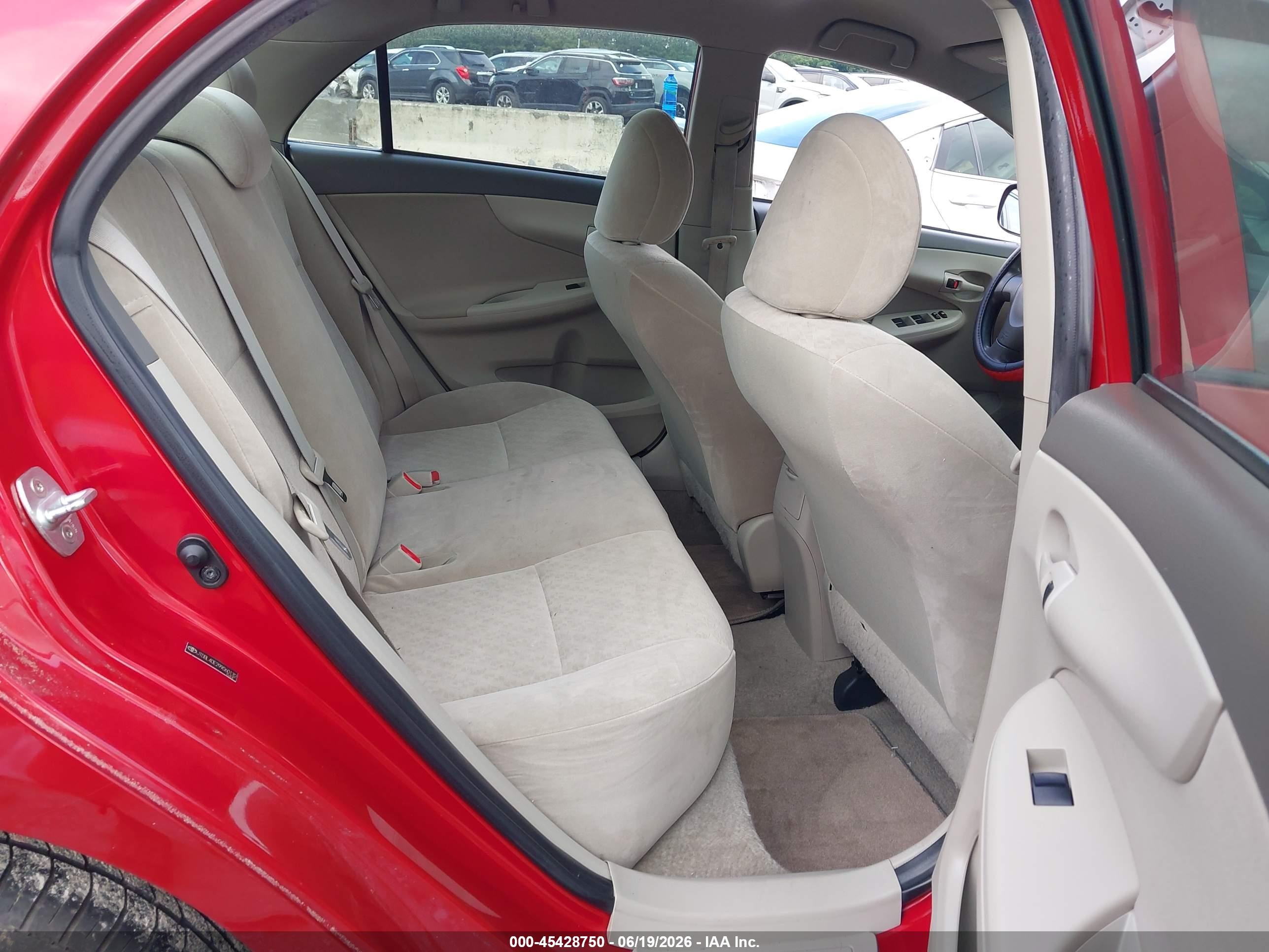 2009 Toyota Corolla Le Red vin: JTDBL40E299060132