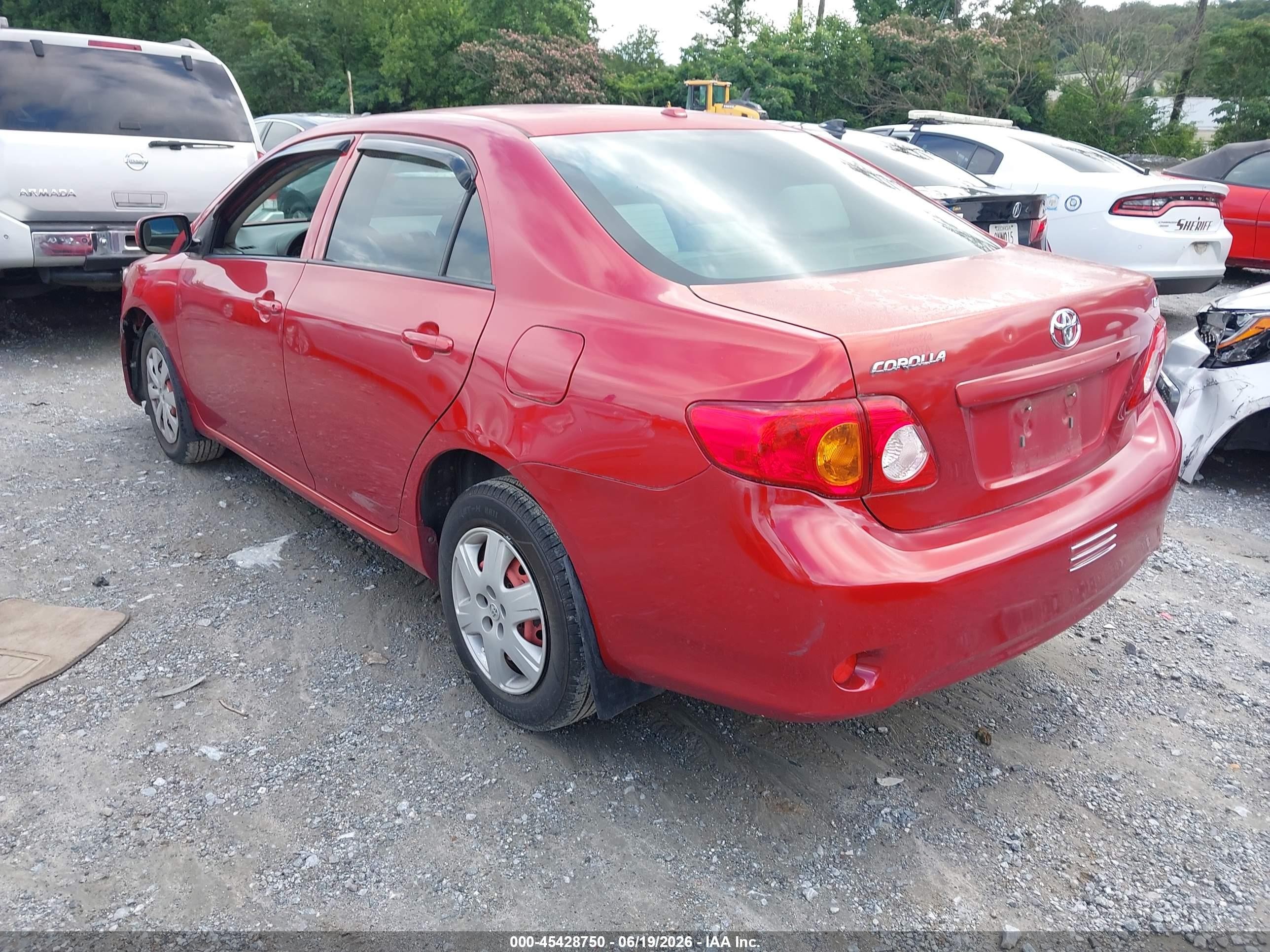 2009 Toyota Corolla Le Red vin: JTDBL40E299060132
