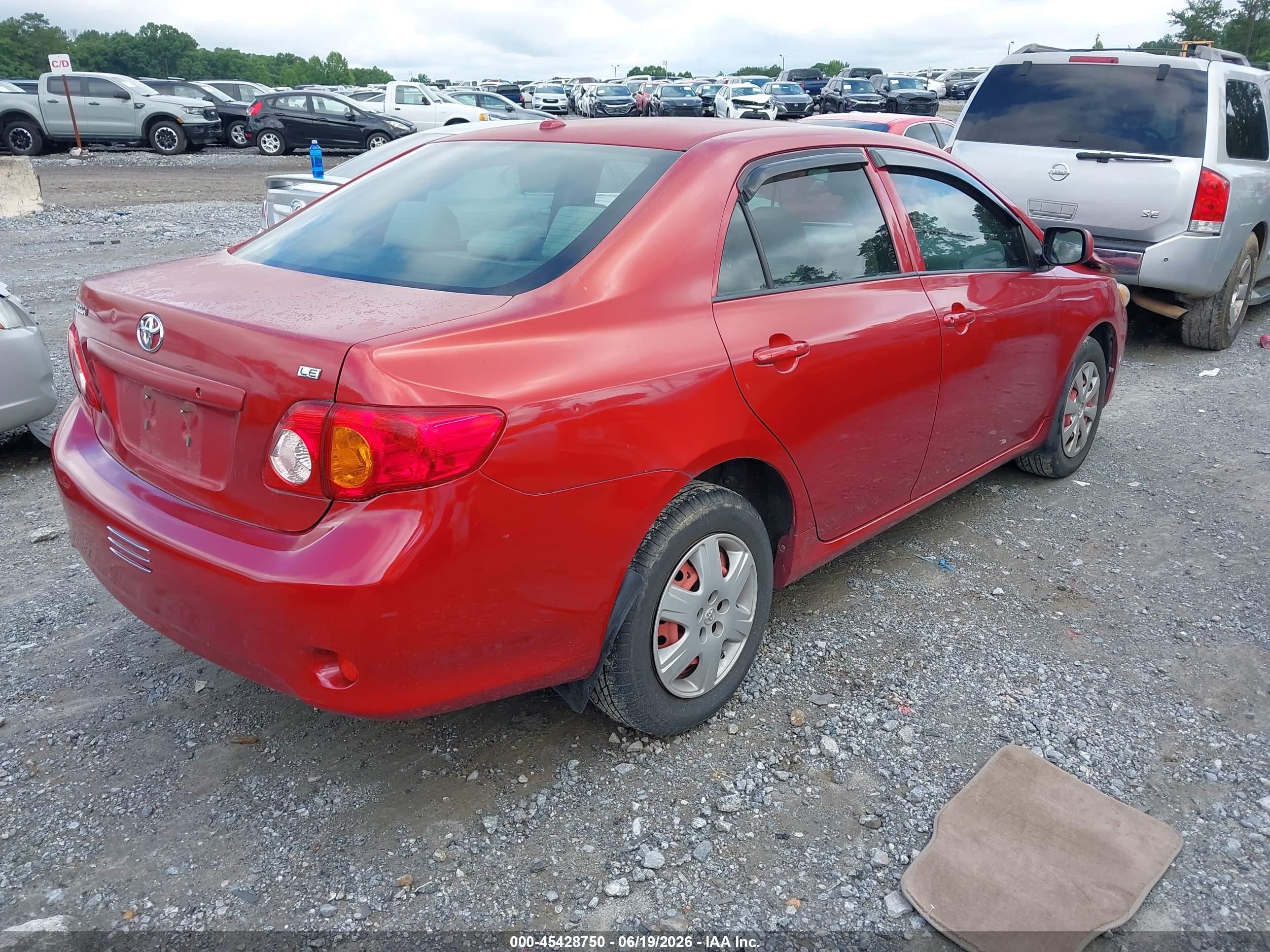 2009 Toyota Corolla Le Red vin: JTDBL40E299060132