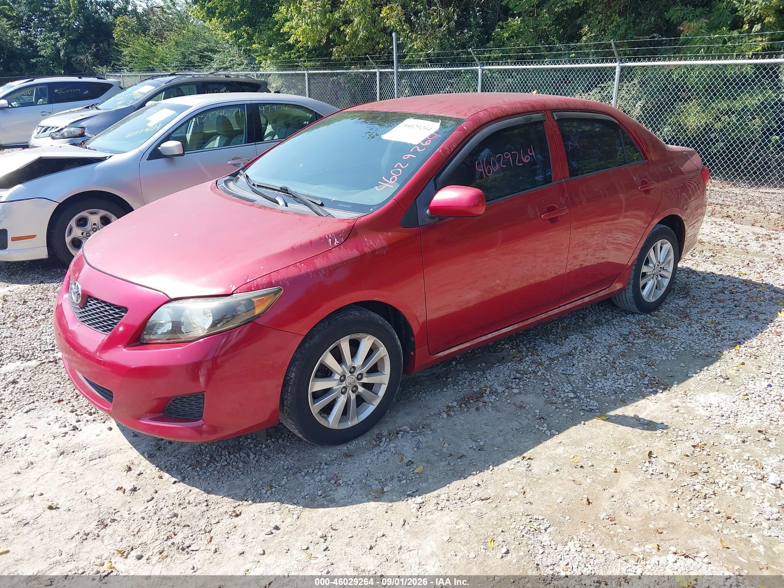 2009 Toyota Corolla Le Красный vin: JTDBL40E299063399