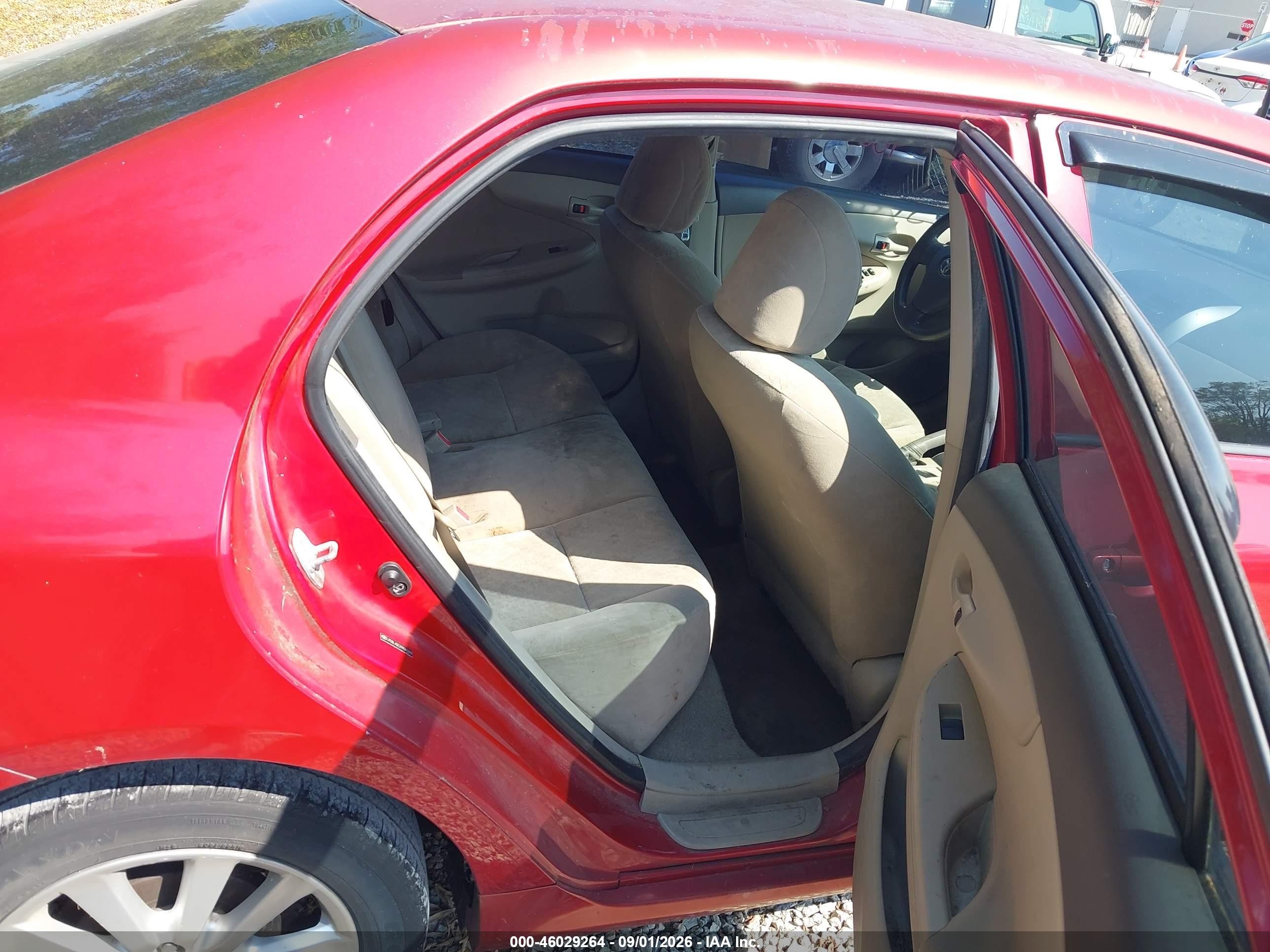 2009 Toyota Corolla Le Красный vin: JTDBL40E299063399