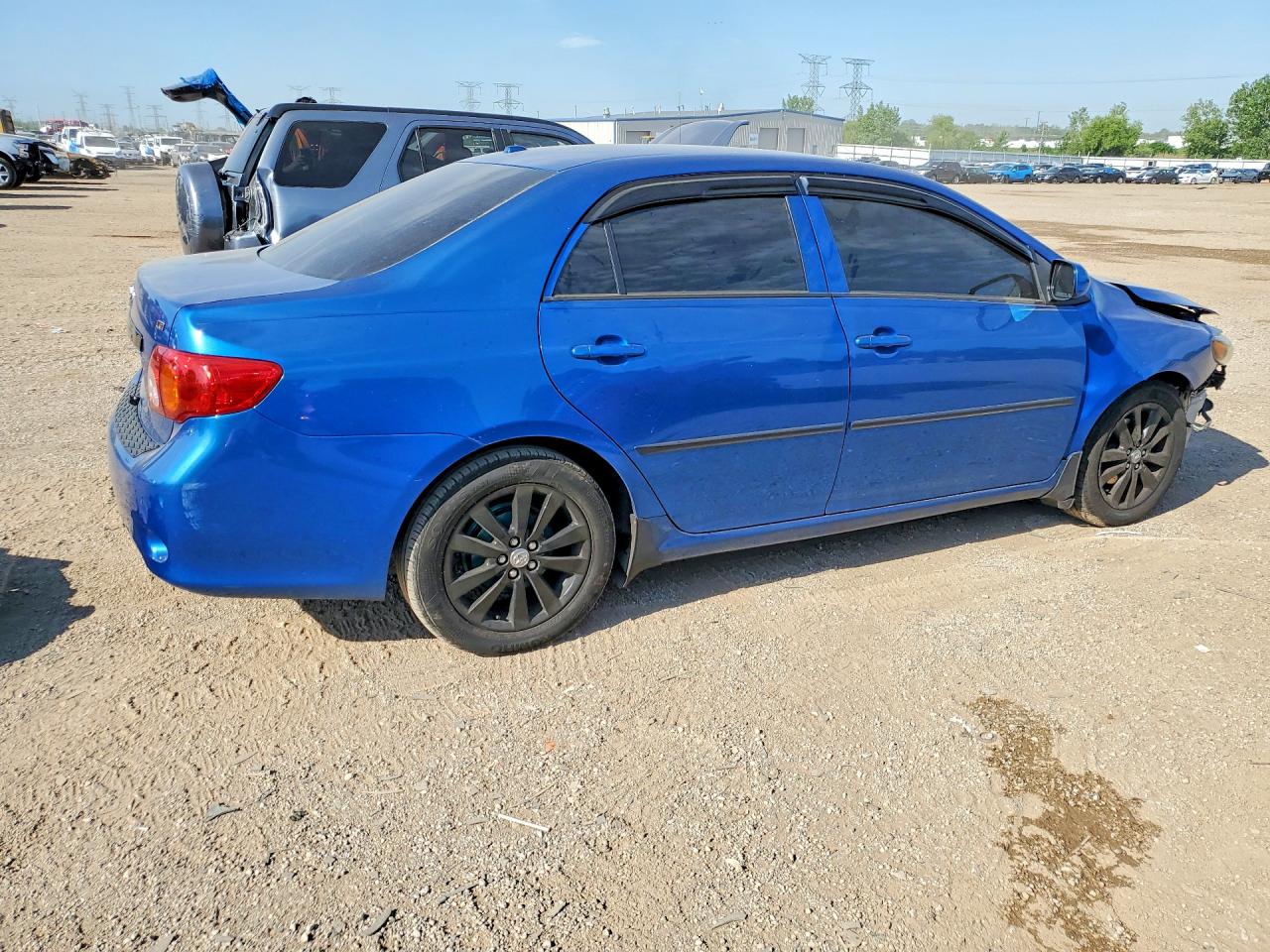2009 Toyota Corolla Le Blue vin: JTDBL40E299076153