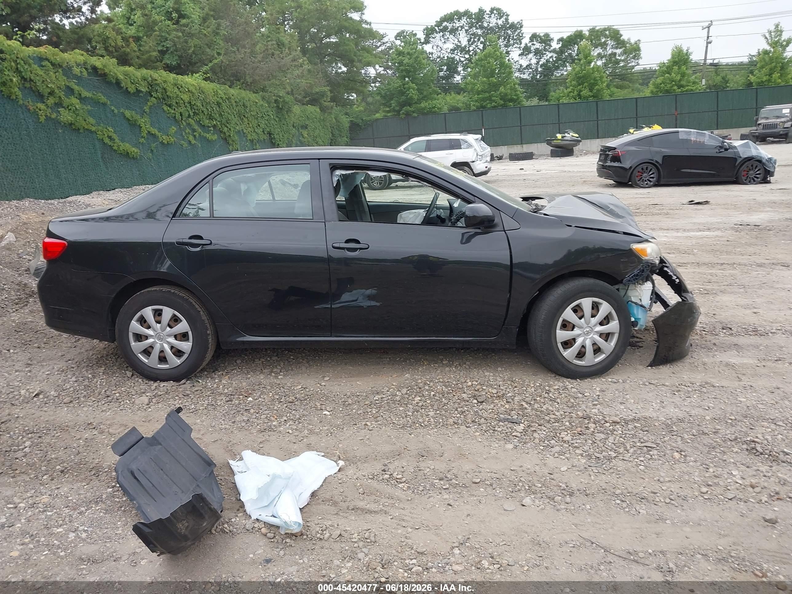 2009 Toyota Corolla Le Black vin: JTDBL40E299084057