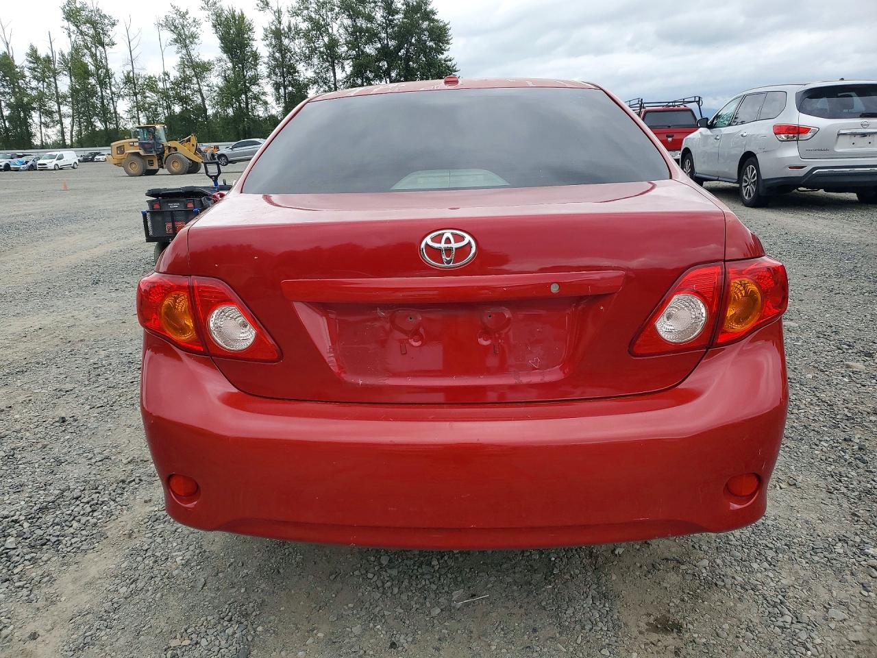 2009 Toyota Corolla Le Red vin: JTDBL40E399024367