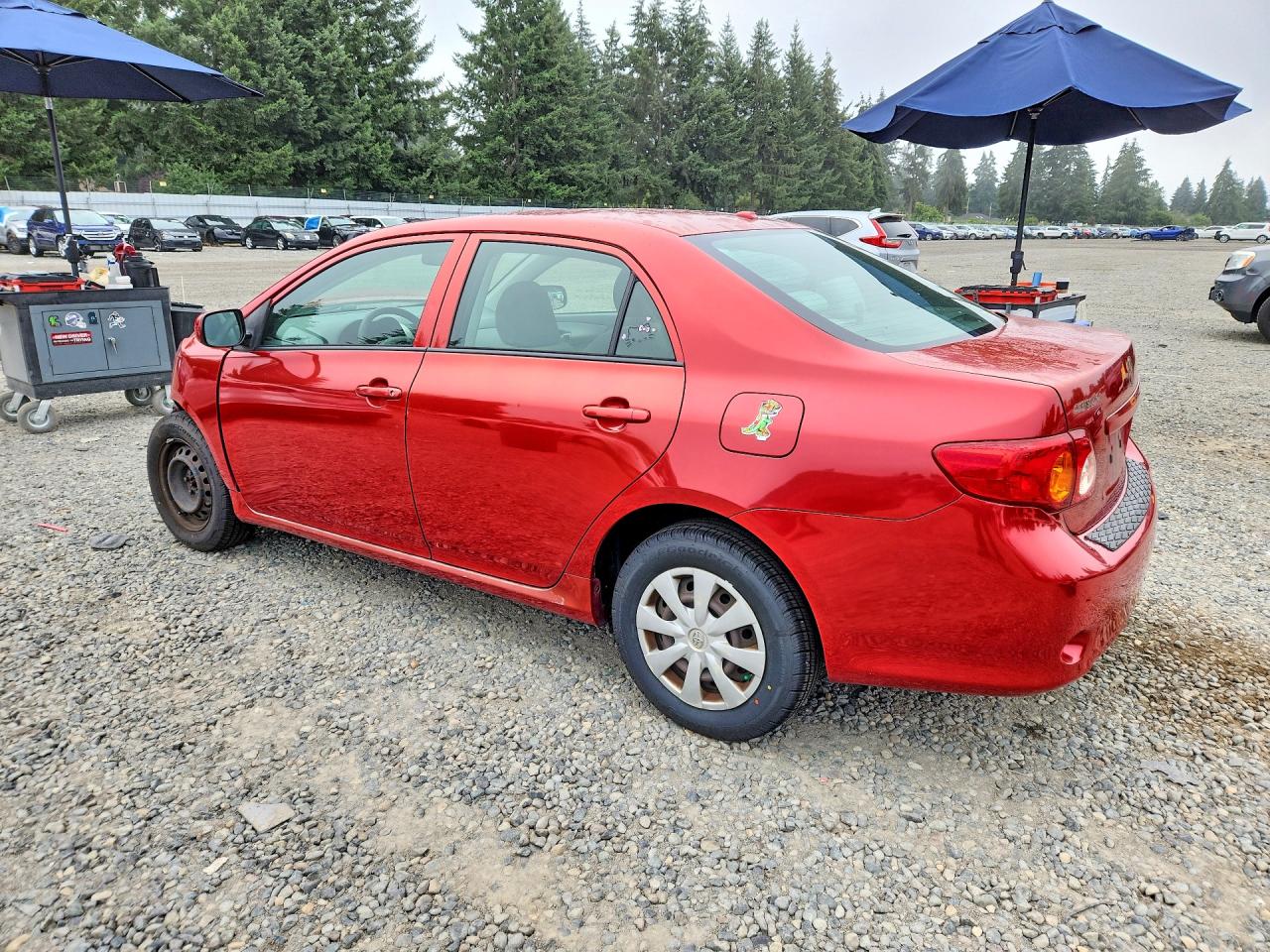 2009 Toyota Corolla Le Red vin: JTDBL40E499020876