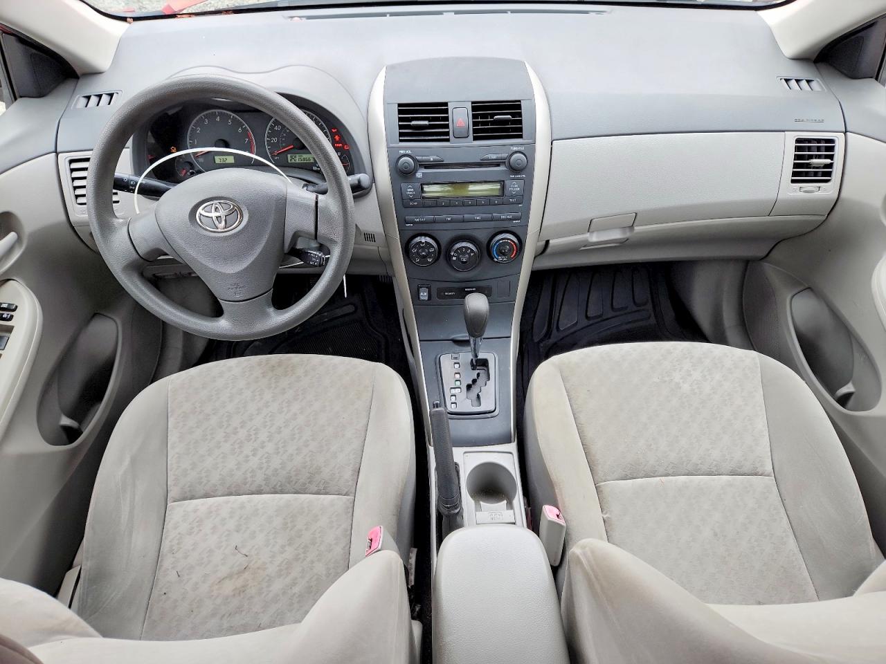 2009 Toyota Corolla Le Red vin: JTDBL40E499020876