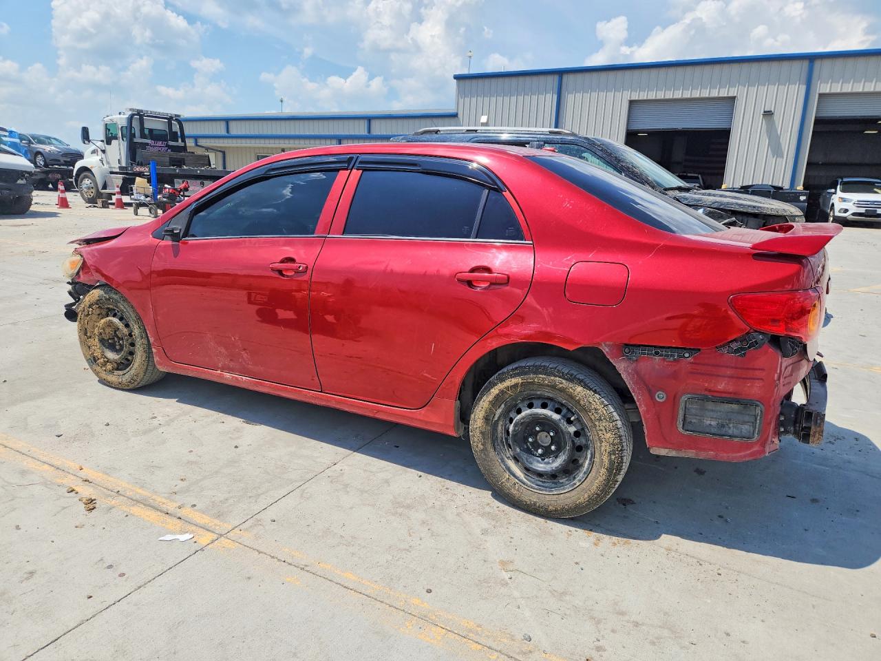 2009 Toyota Corolla Le Red vin: JTDBL40E499056664