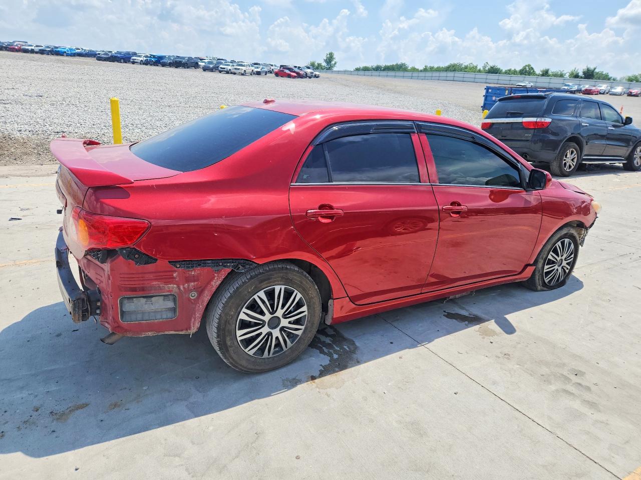 2009 Toyota Corolla Le Red vin: JTDBL40E499056664