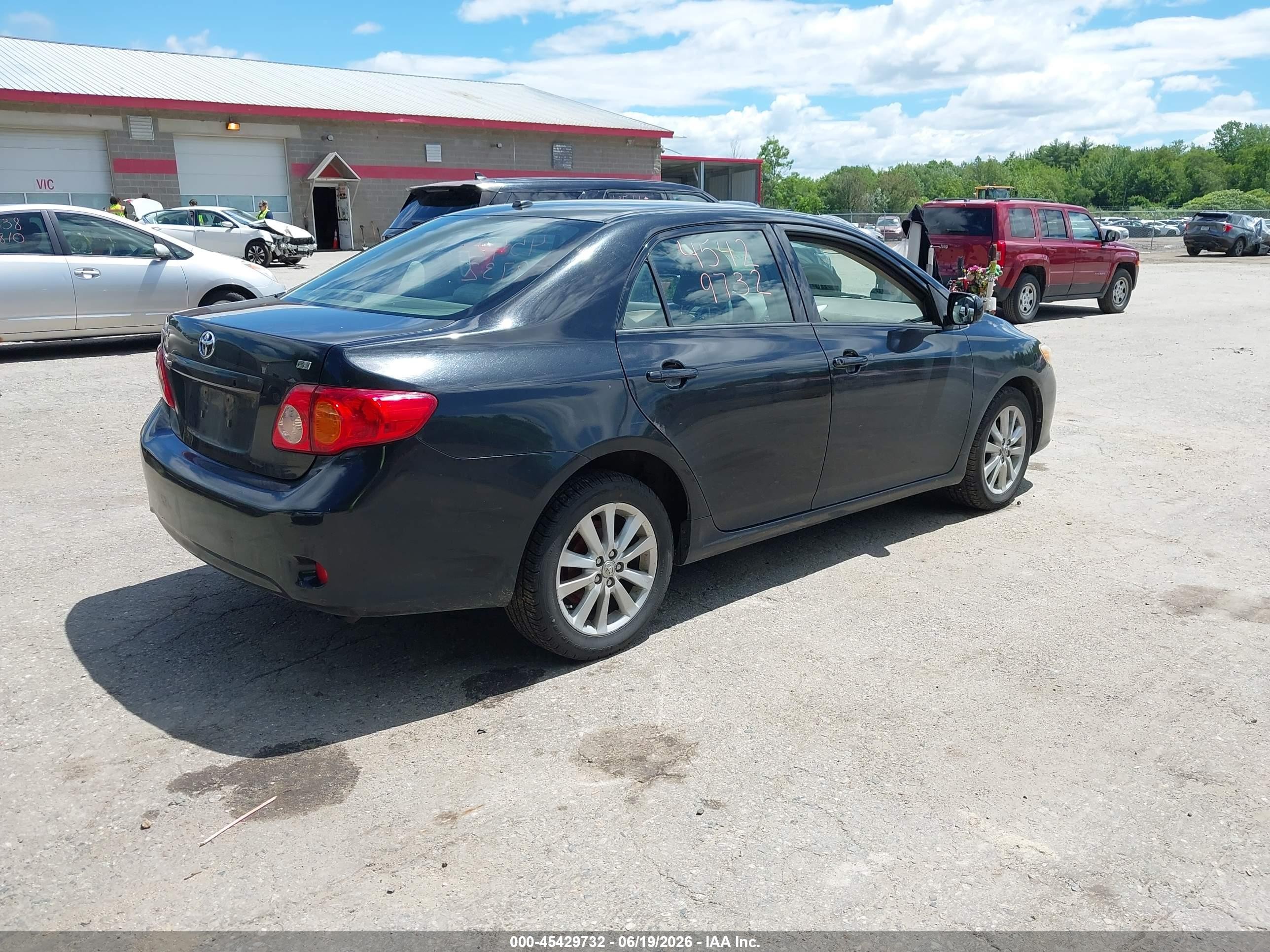 2009 Toyota Corolla Le Black vin: JTDBL40E499070032