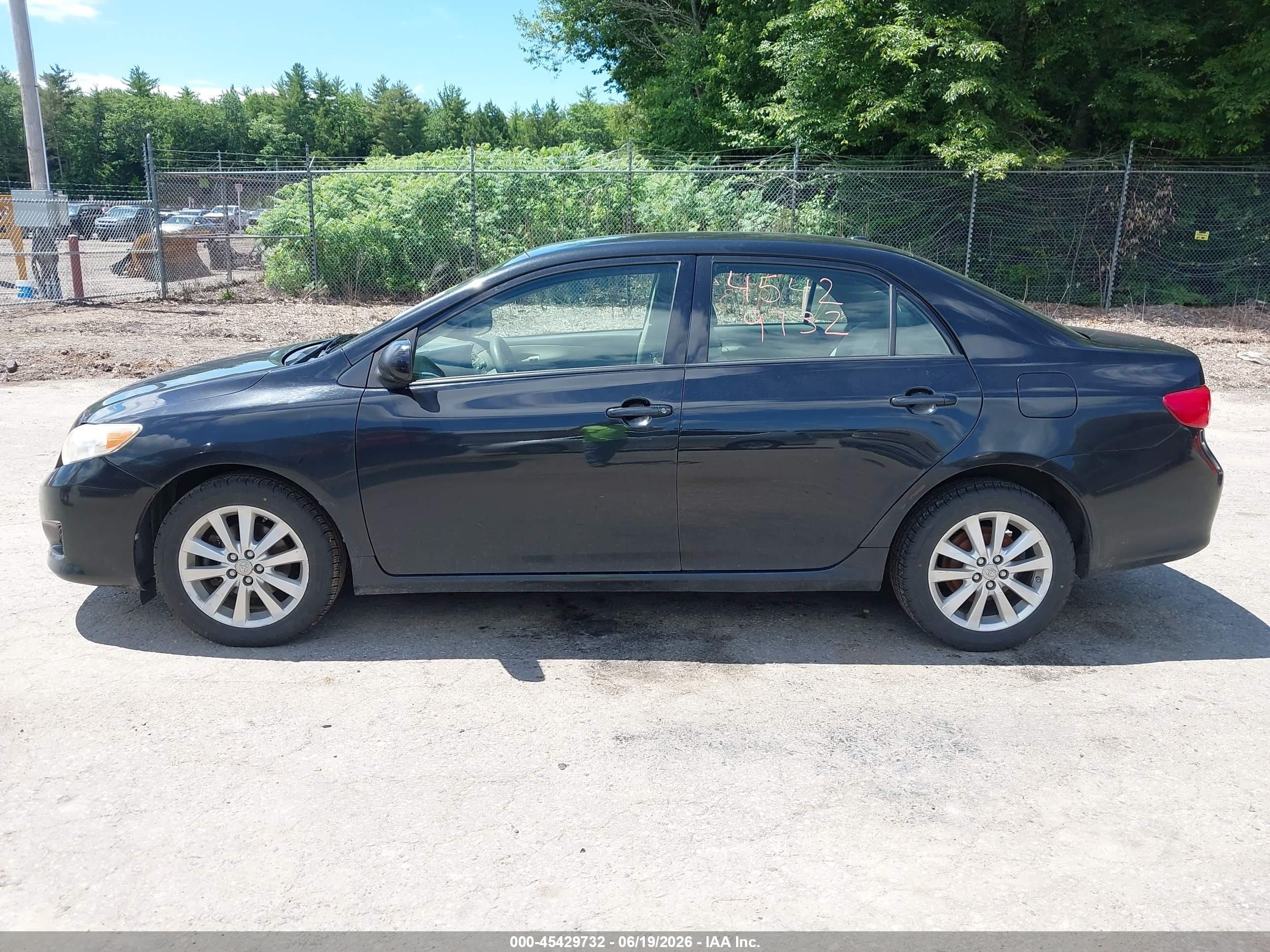 2009 Toyota Corolla Le Black vin: JTDBL40E499070032