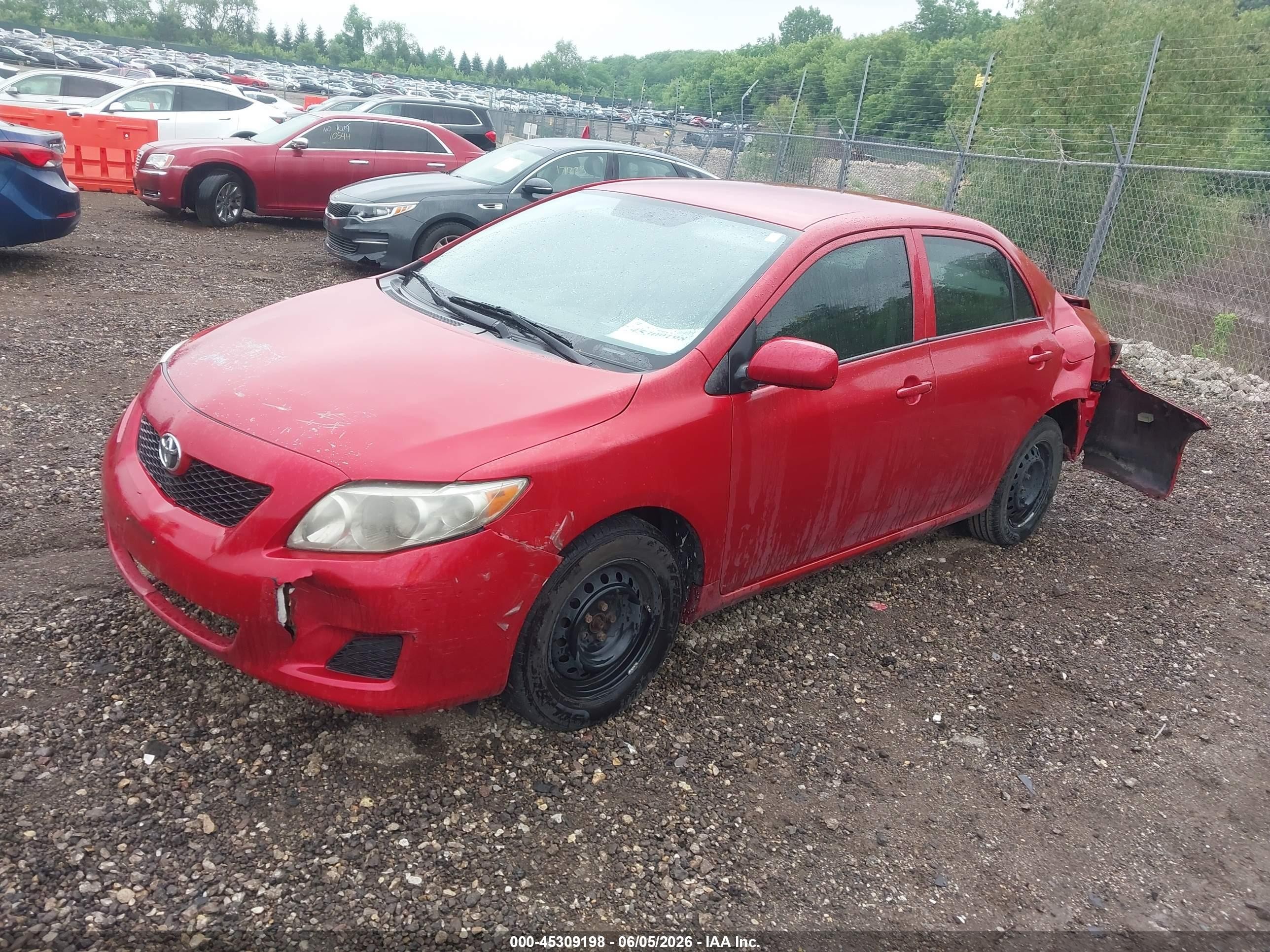 2009 Toyota Corolla Le Red vin: JTDBL40E49J034131